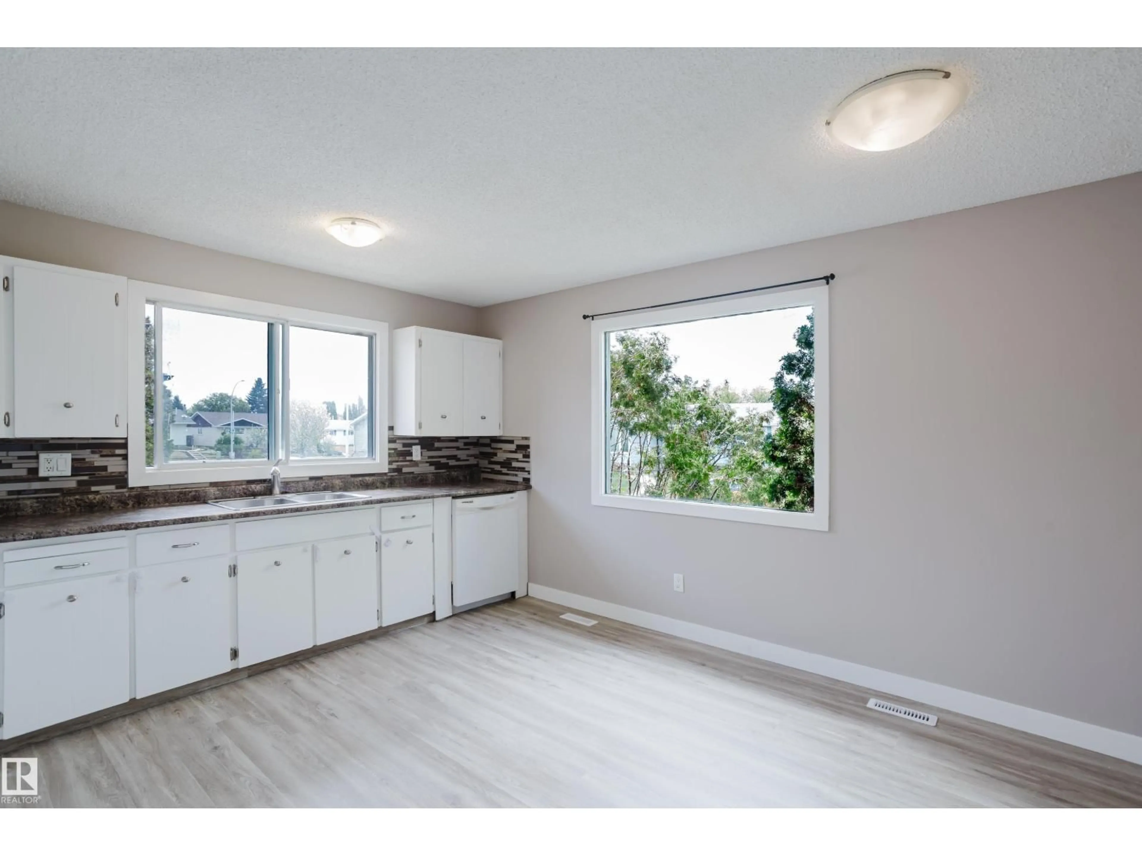 Open concept kitchen, unknown for 11916 152A AV, Edmonton Alberta T5X1E6
