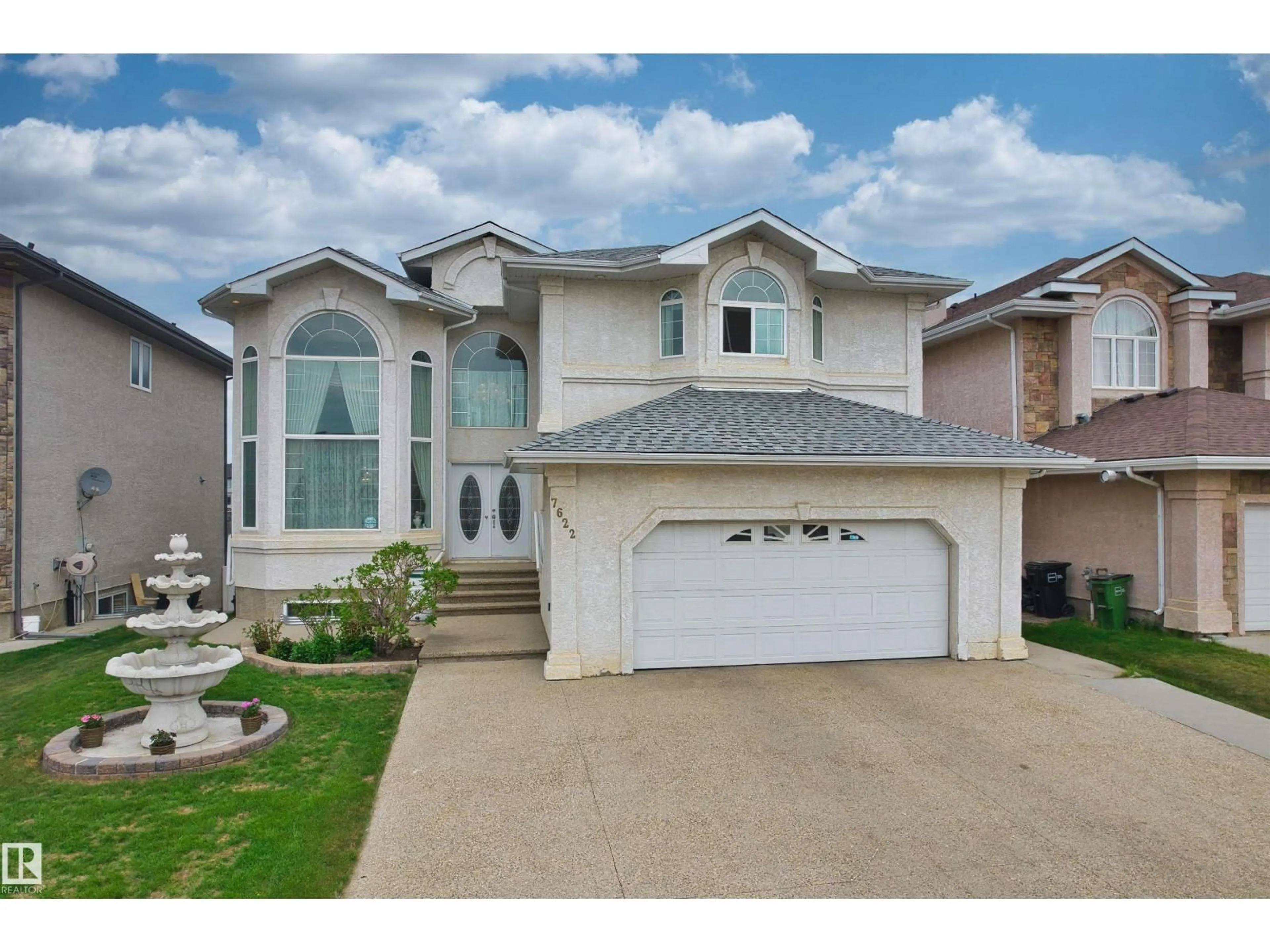 Home with vinyl exterior material, street for 7622 168A AV, Edmonton Alberta T5Z3Y7