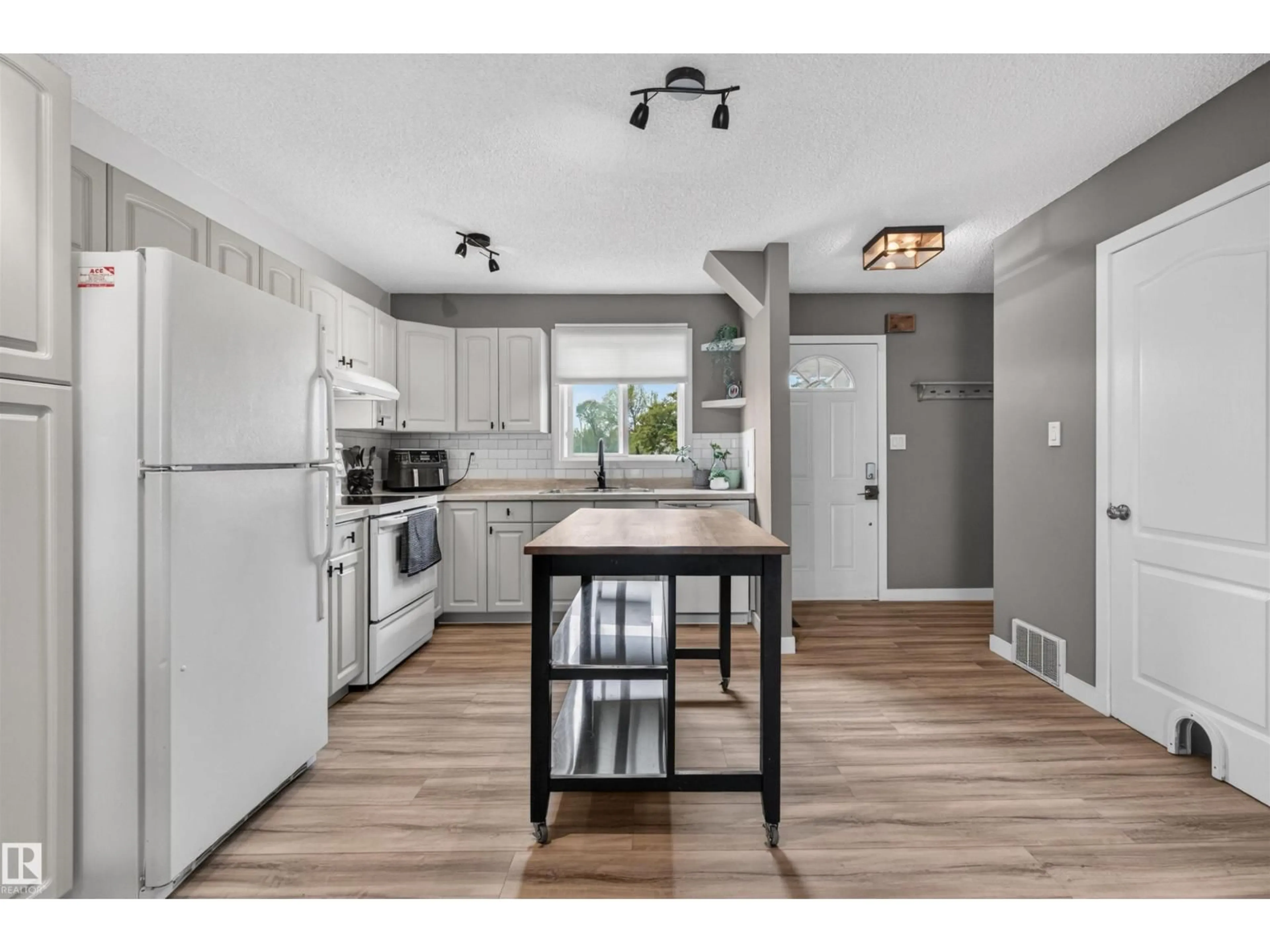 Open concept kitchen, unknown for 18116 81 AV, Edmonton Alberta T5T1S4