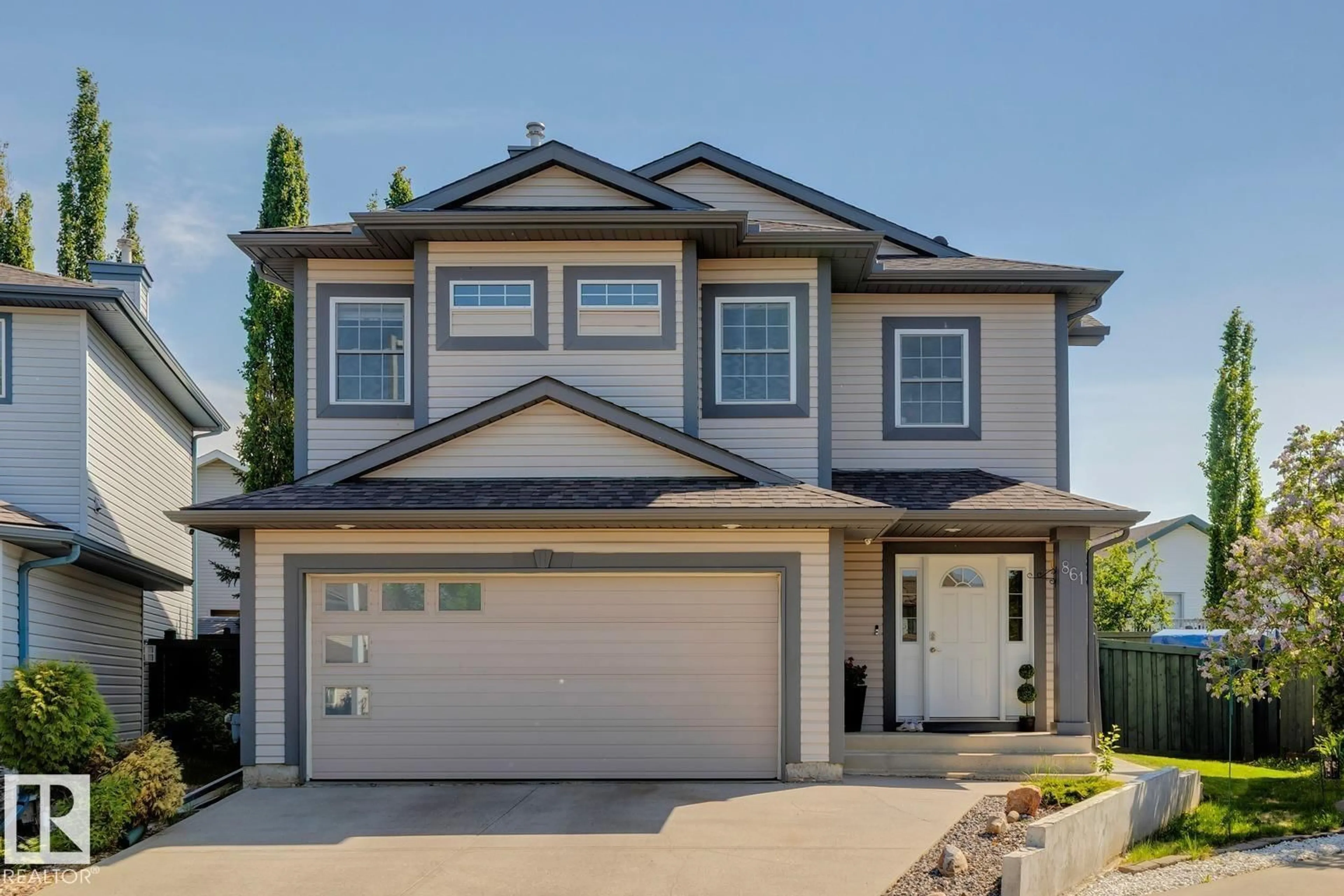 Home with vinyl exterior material, street for 861 GRAHAM WD, Edmonton Alberta T5T6N4