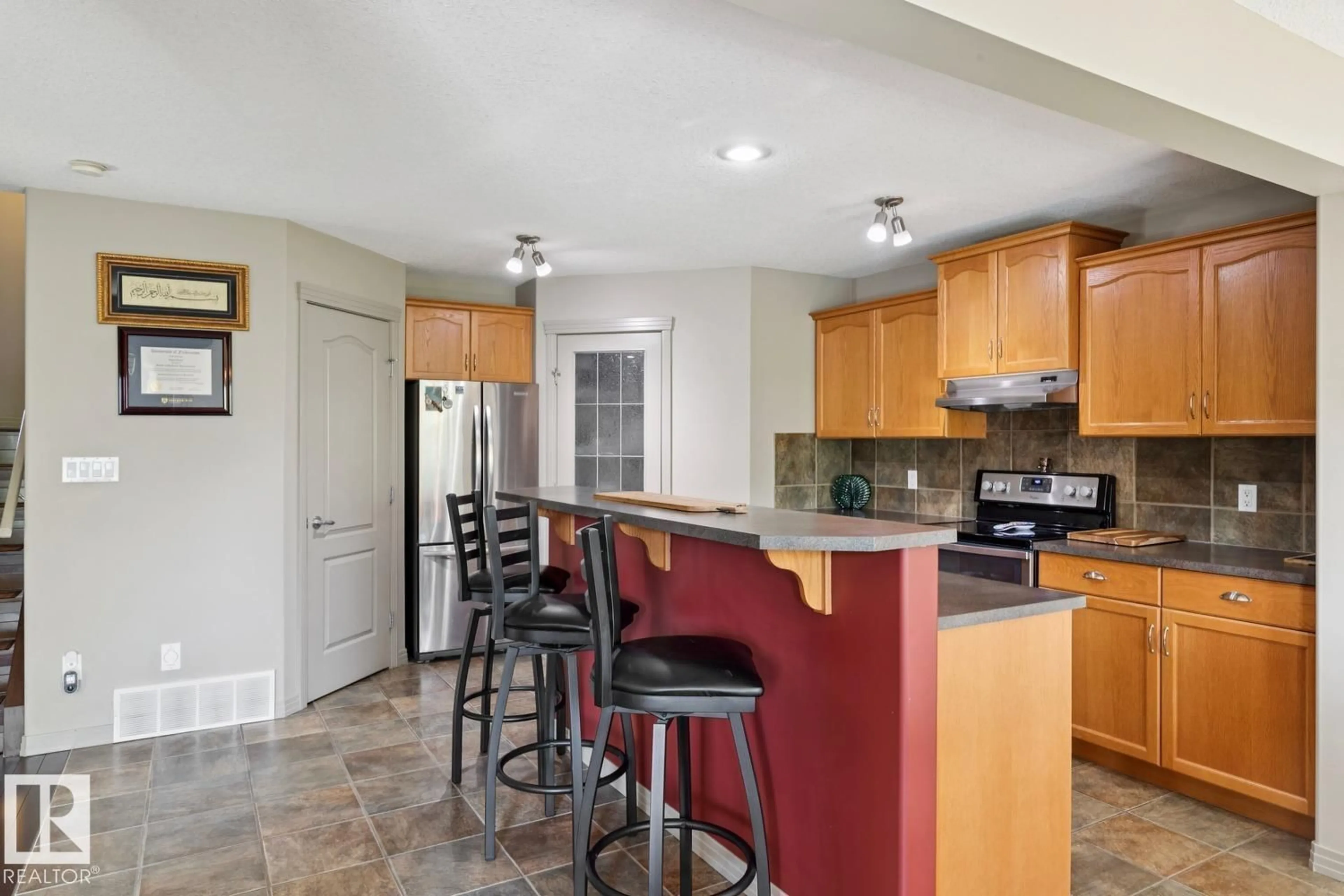 Open concept kitchen, ceramic/tile floor for 861 GRAHAM WD, Edmonton Alberta T5T6N4