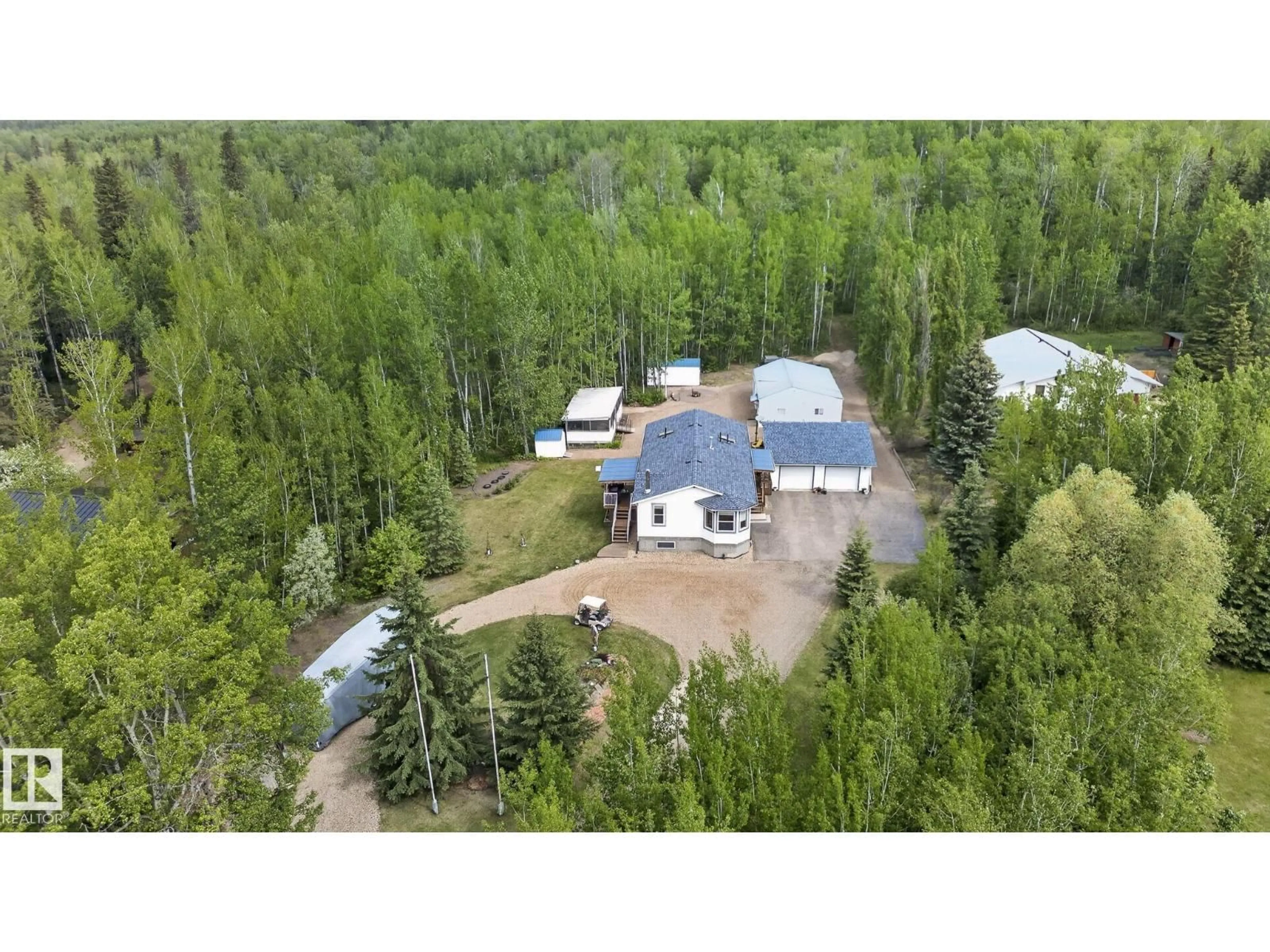 A pic from outside/outdoor area/front of a property/back of a property/a pic from drone, forest/trees view for 3602 53 AV, Rural Wetaskiwin County Alberta T0C2C0