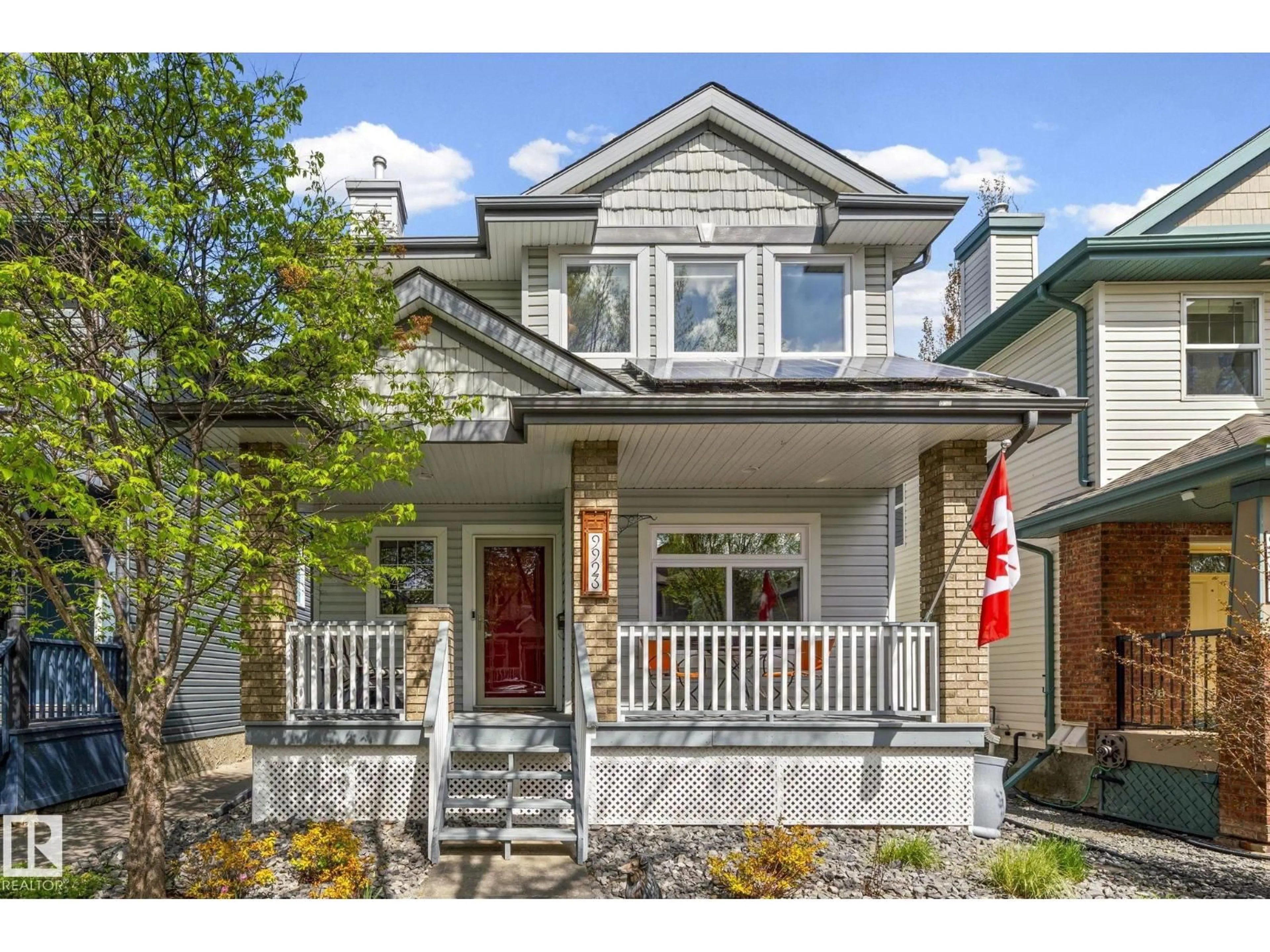 Home with vinyl exterior material, street for 9923 89 ST, Edmonton Alberta T5H4N3