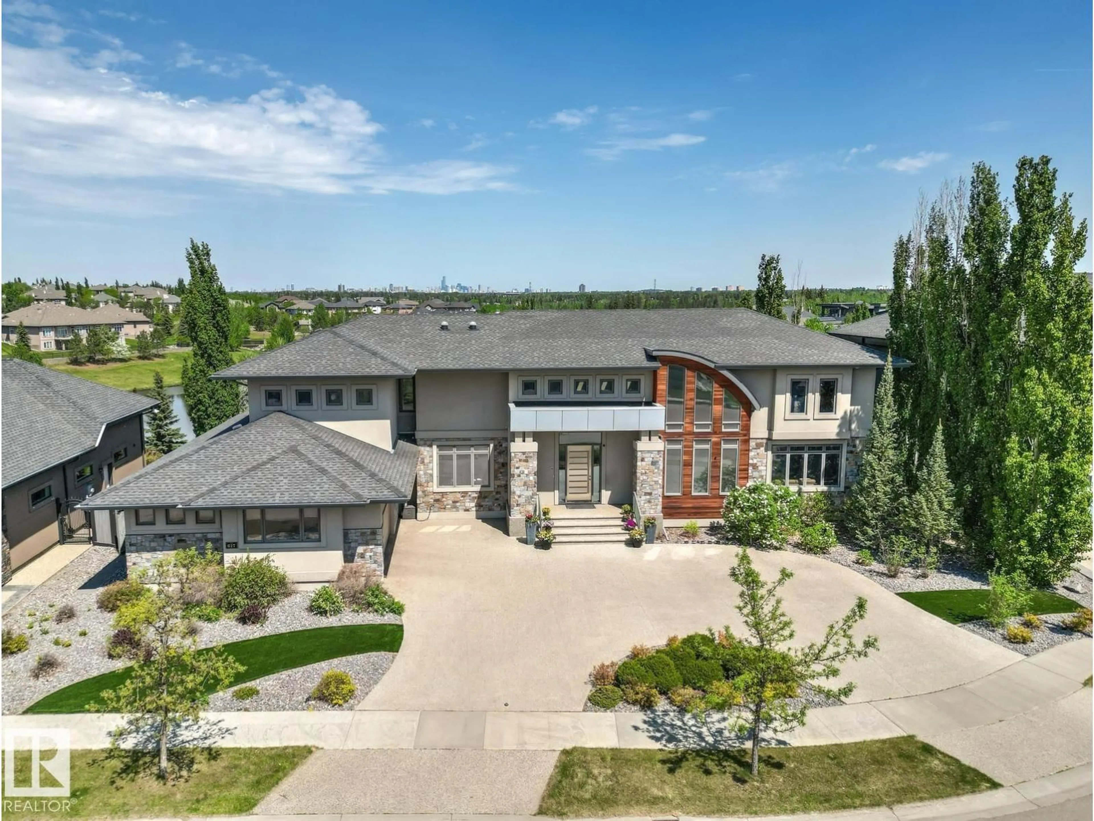 A pic from outside/outdoor area/front of a property/back of a property/a pic from drone, unknown for 617 MAGRATH VW, Edmonton Alberta T6R0H2