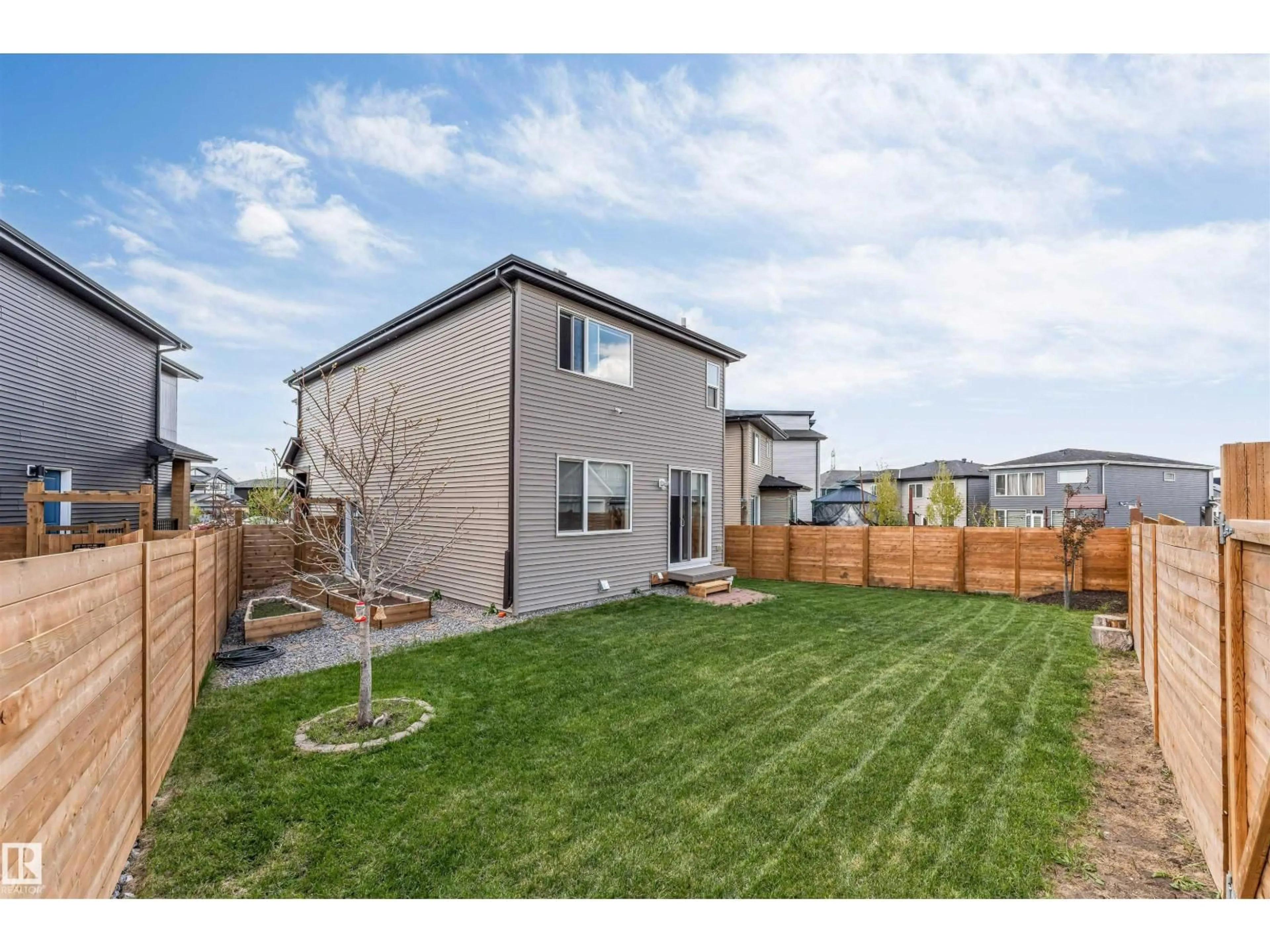 A pic from outside/outdoor area/front of a property/back of a property/a pic from drone, mountain view for SW - 425 41 ST, Edmonton Alberta T6X1A5