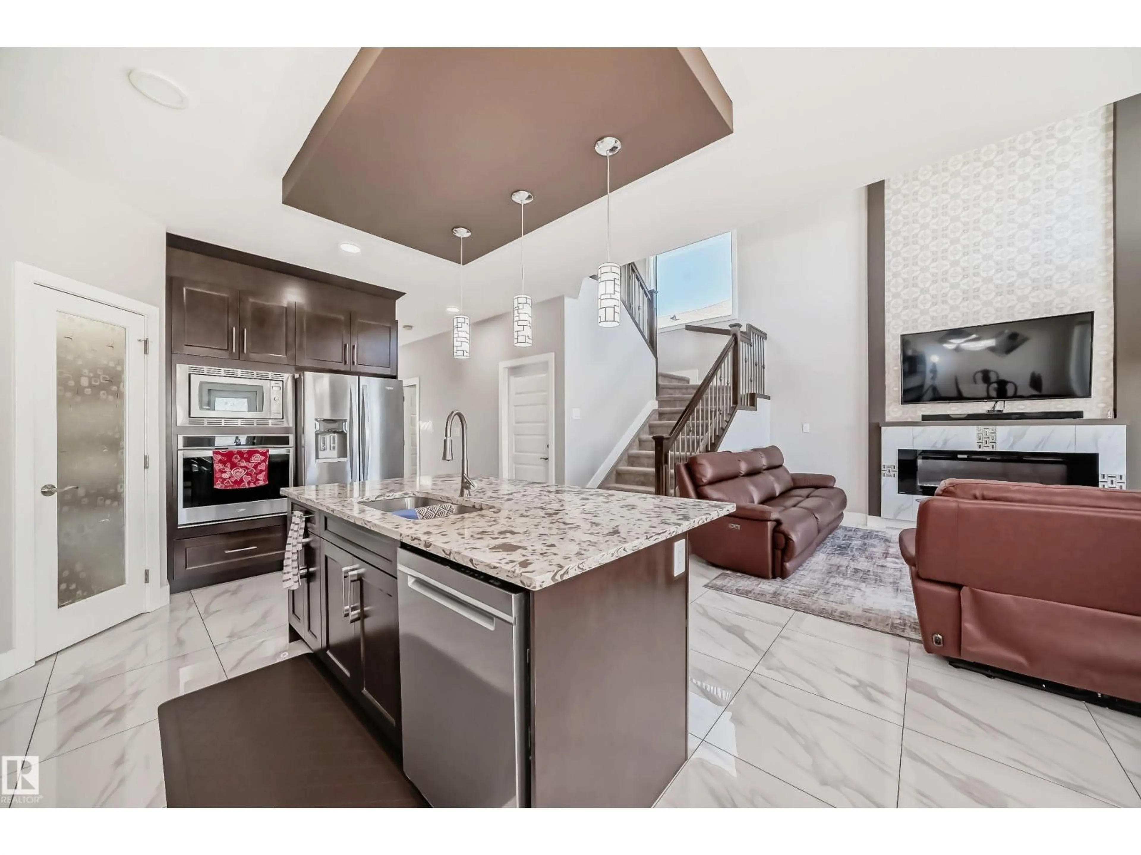 Open concept kitchen, ceramic/tile floor for 2464 15 AV, Edmonton Alberta T6T2L3