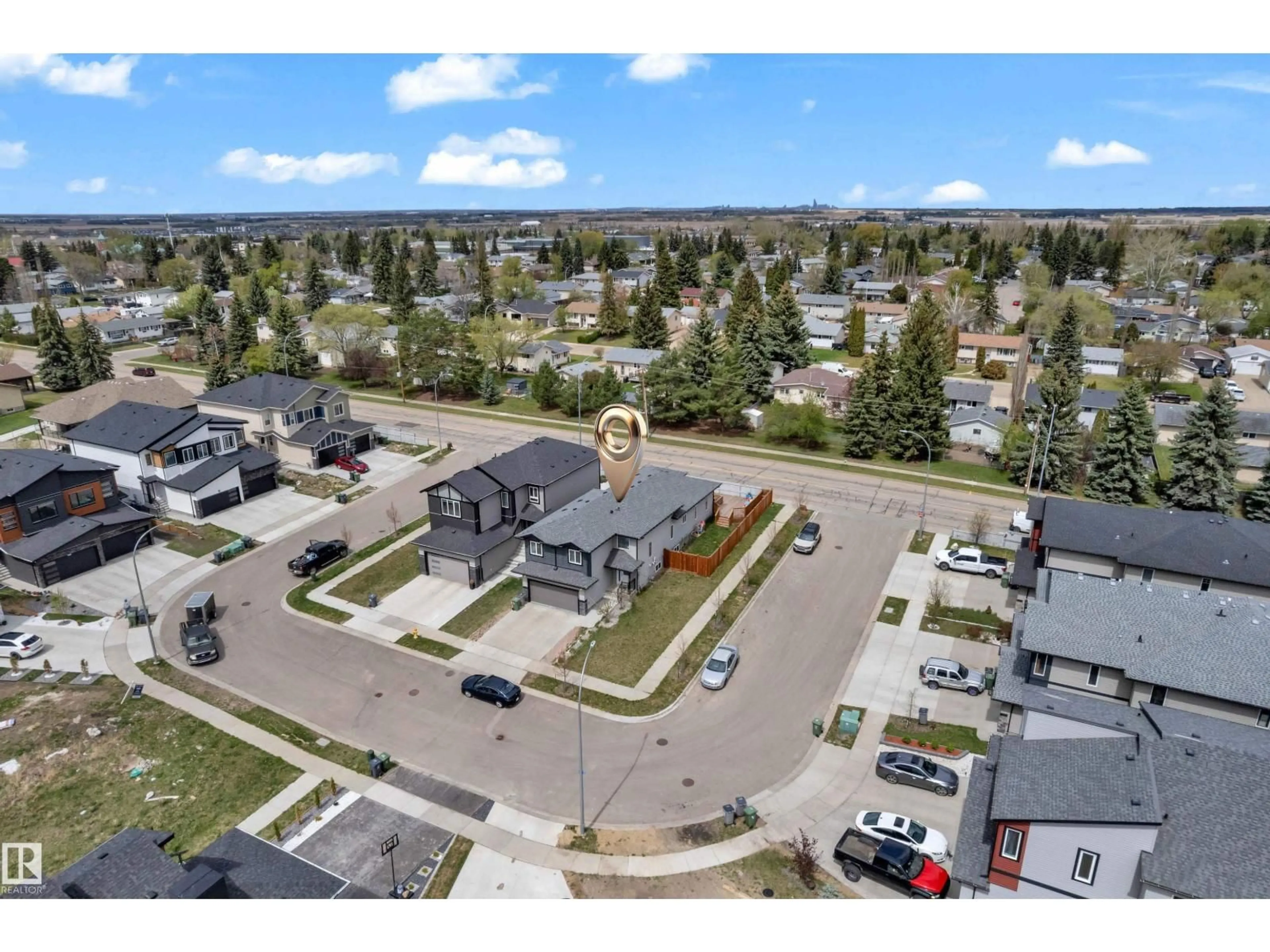 A pic from outside/outdoor area/front of a property/back of a property/a pic from drone, street for 4506 49 AV, Beaumont Alberta T4X2B2