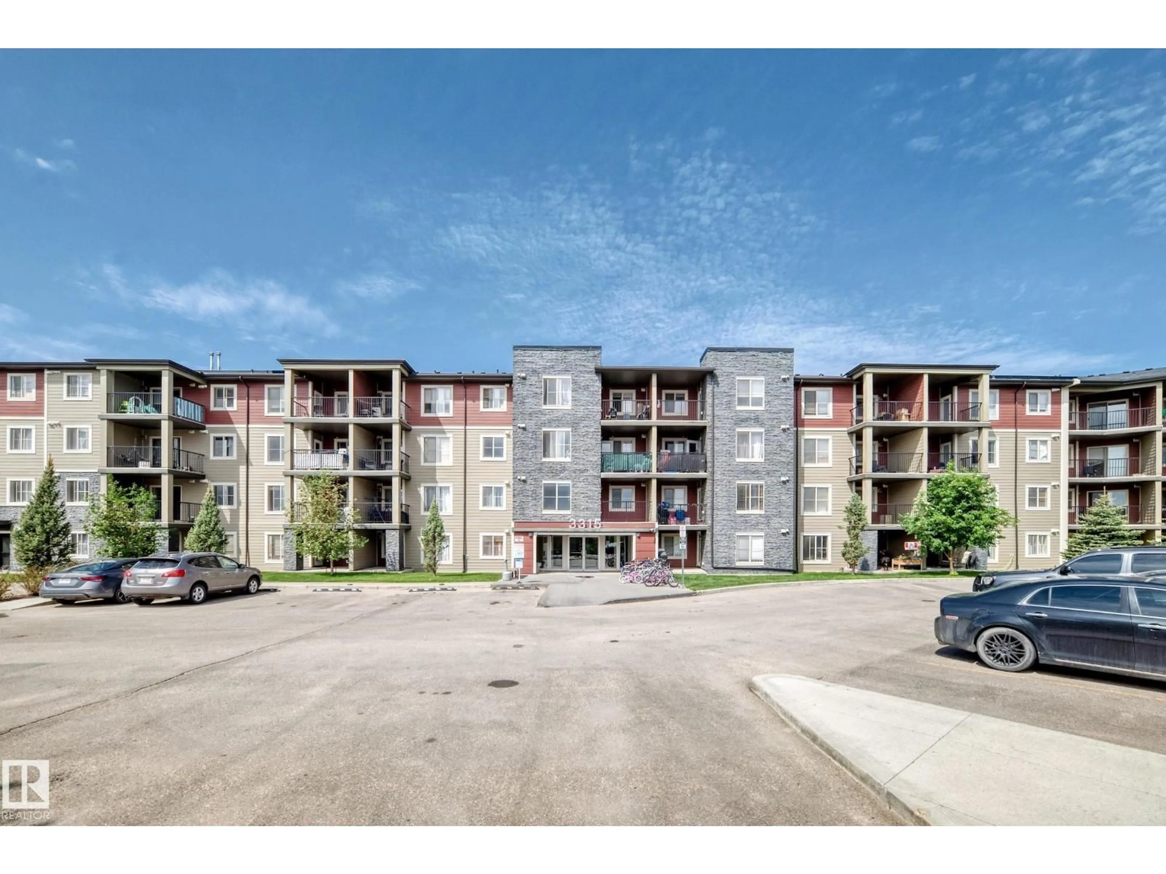 A pic from outside/outdoor area/front of a property/back of a property/a pic from drone, building for #103 - 3315 JAMES MOWATT TR, Edmonton Alberta T6W3L9