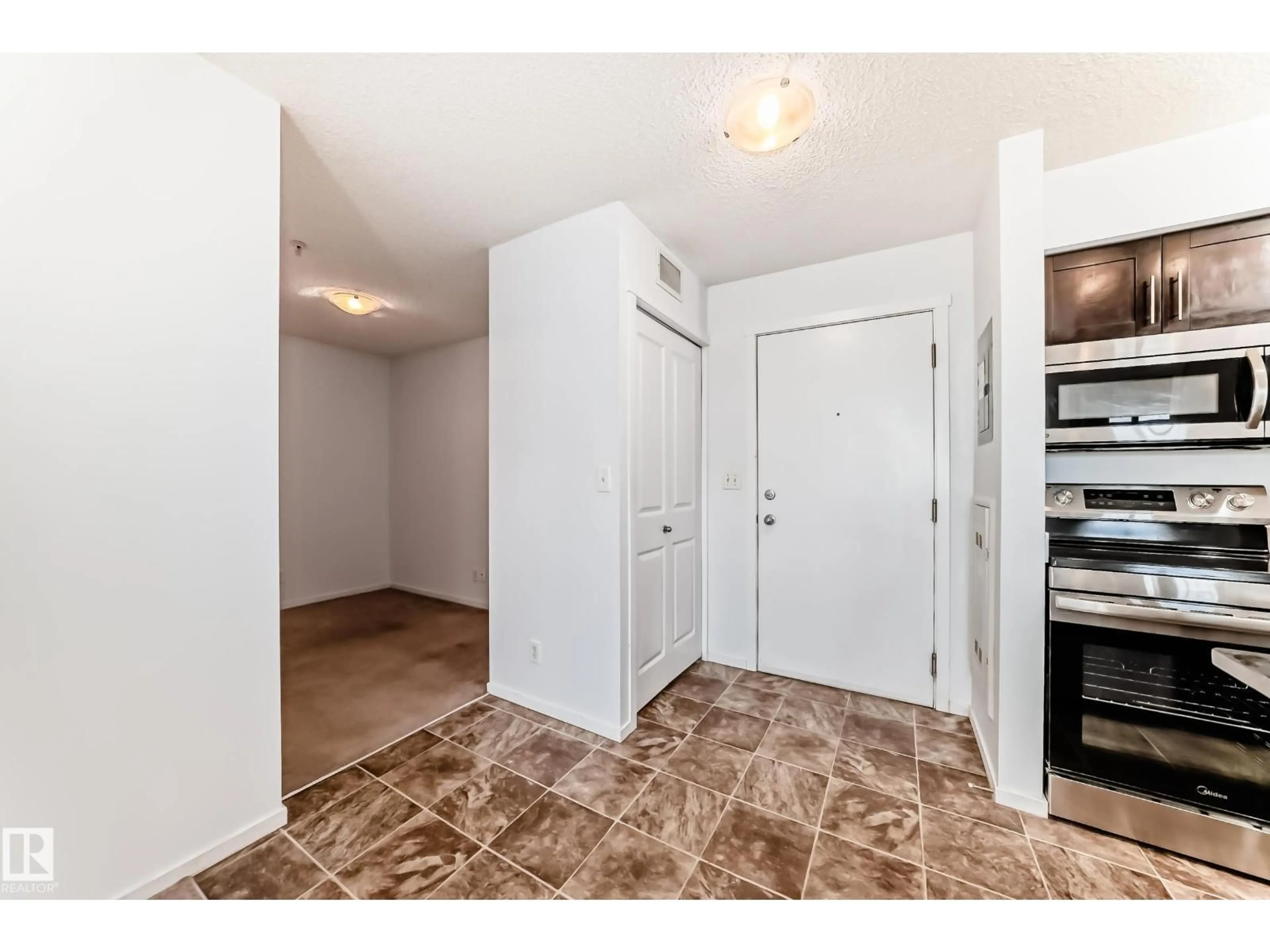 Indoor entryway for #103 - 3315 JAMES MOWATT TR, Edmonton Alberta T6W3L9
