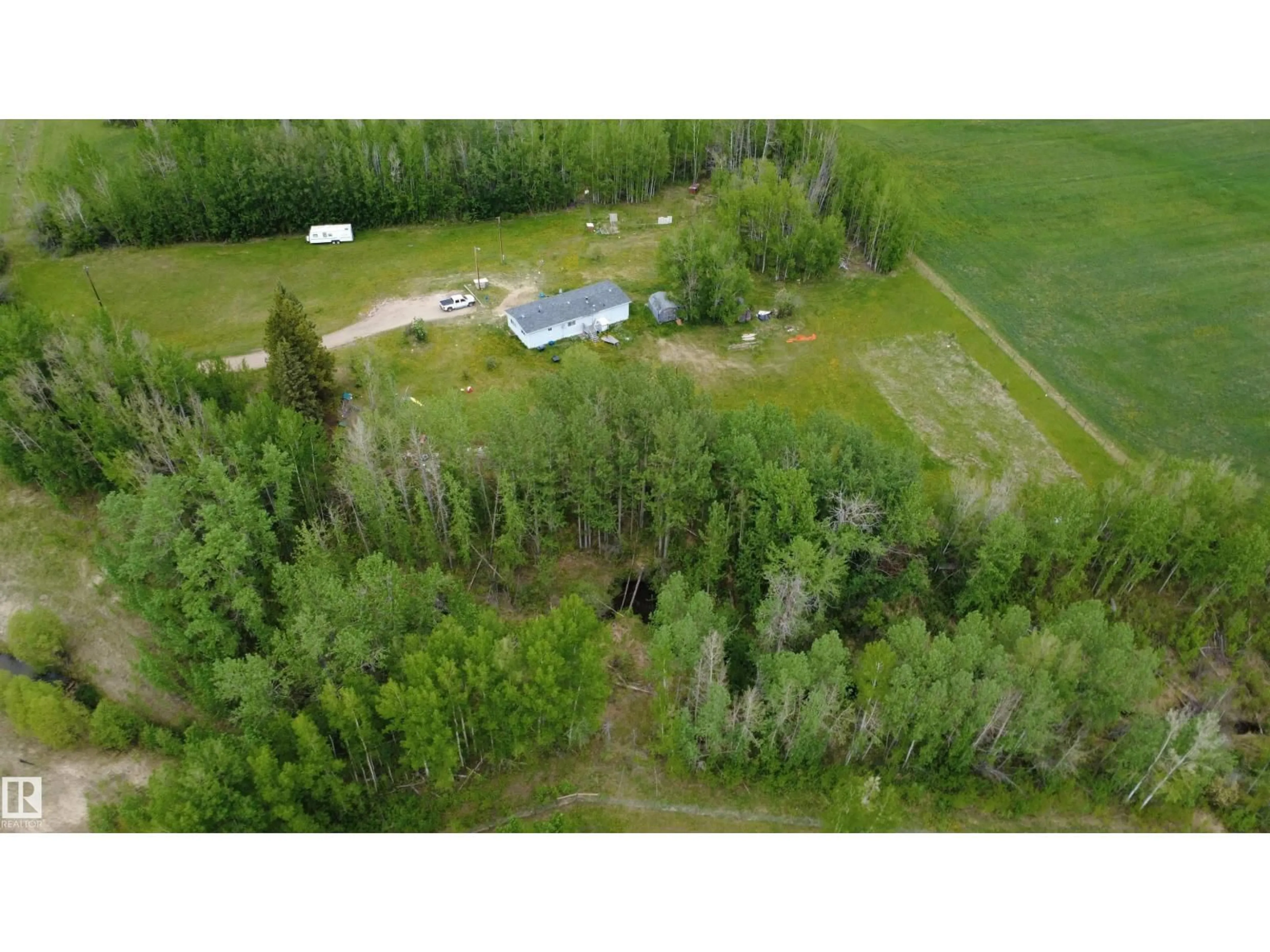 A pic from outside/outdoor area/front of a property/back of a property/a pic from drone, forest/trees view for 50521 HWY 22, Rural Brazeau County Alberta T7A2A2