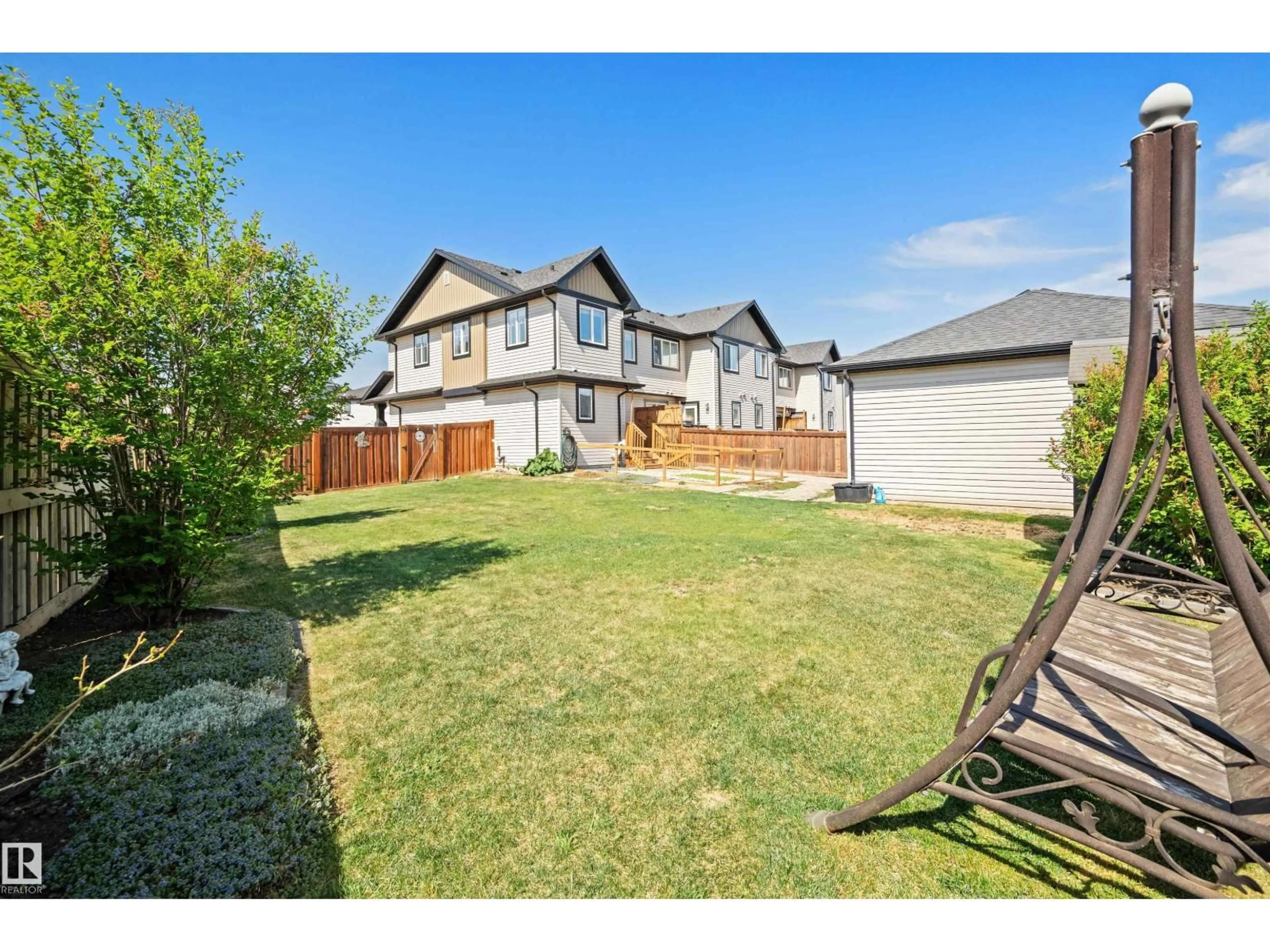 A pic from outside/outdoor area/front of a property/back of a property/a pic from drone, street for SW - 4478 ANNETT CM, Edmonton Alberta T6W2V7