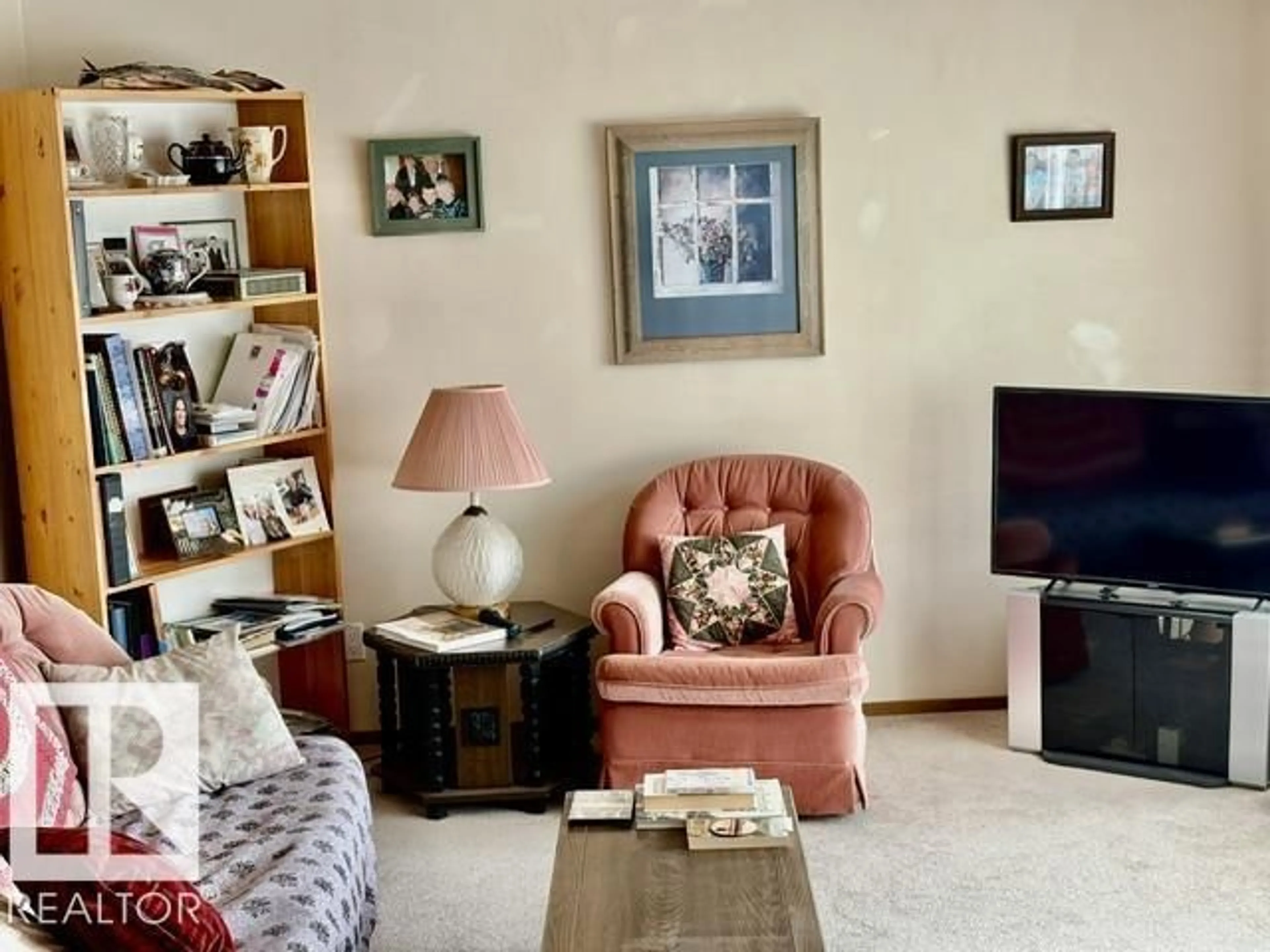 Living room with furniture, unknown for 5454 46 ST, Vegreville Alberta T9C1E5