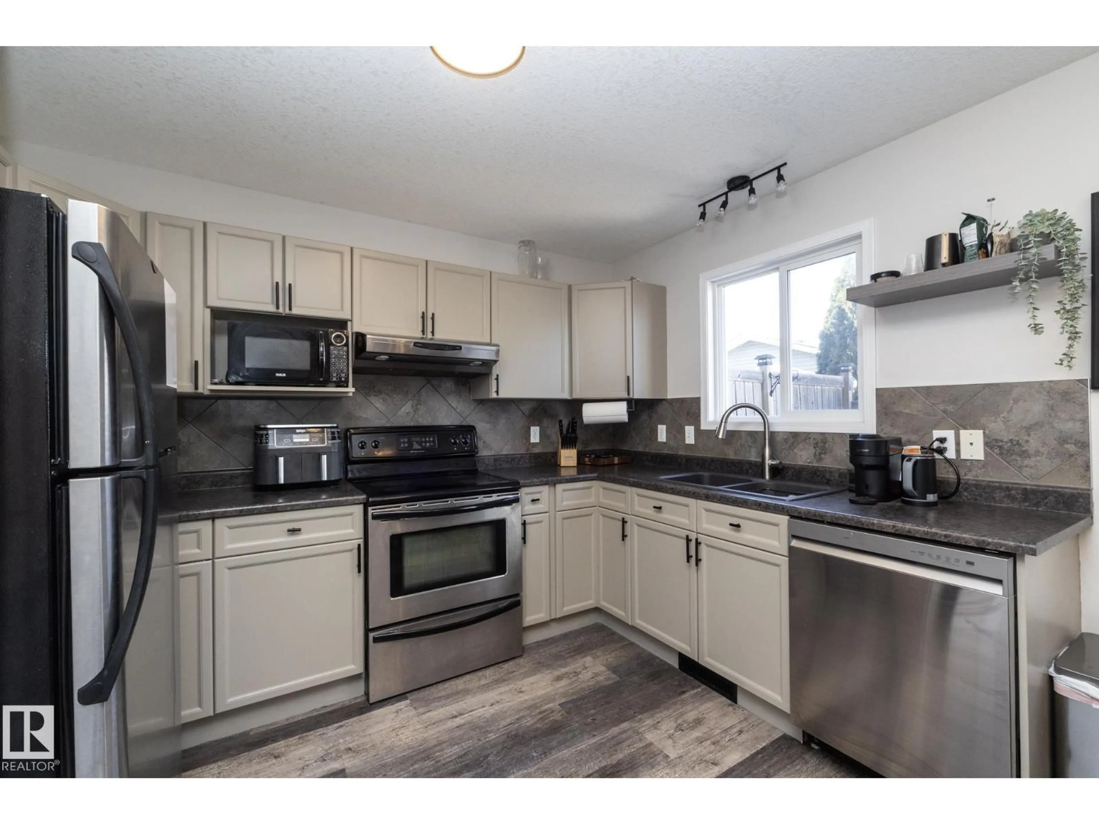 Open concept kitchen, unknown for NW - 4204 161 AV, Edmonton Alberta T5Y0G5