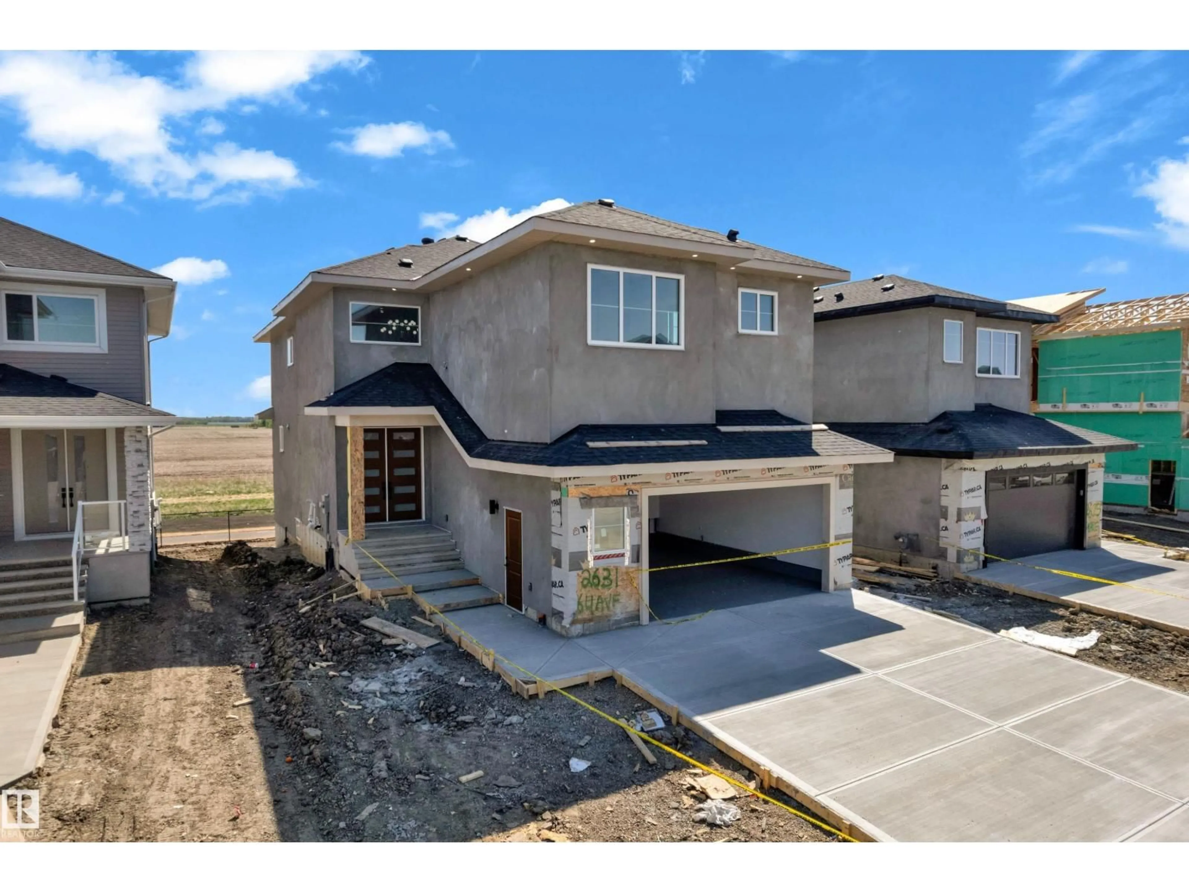 Home with brick exterior material, street for NE - 2631 64 AVE, Rural Leduc County Alberta T4X0H6