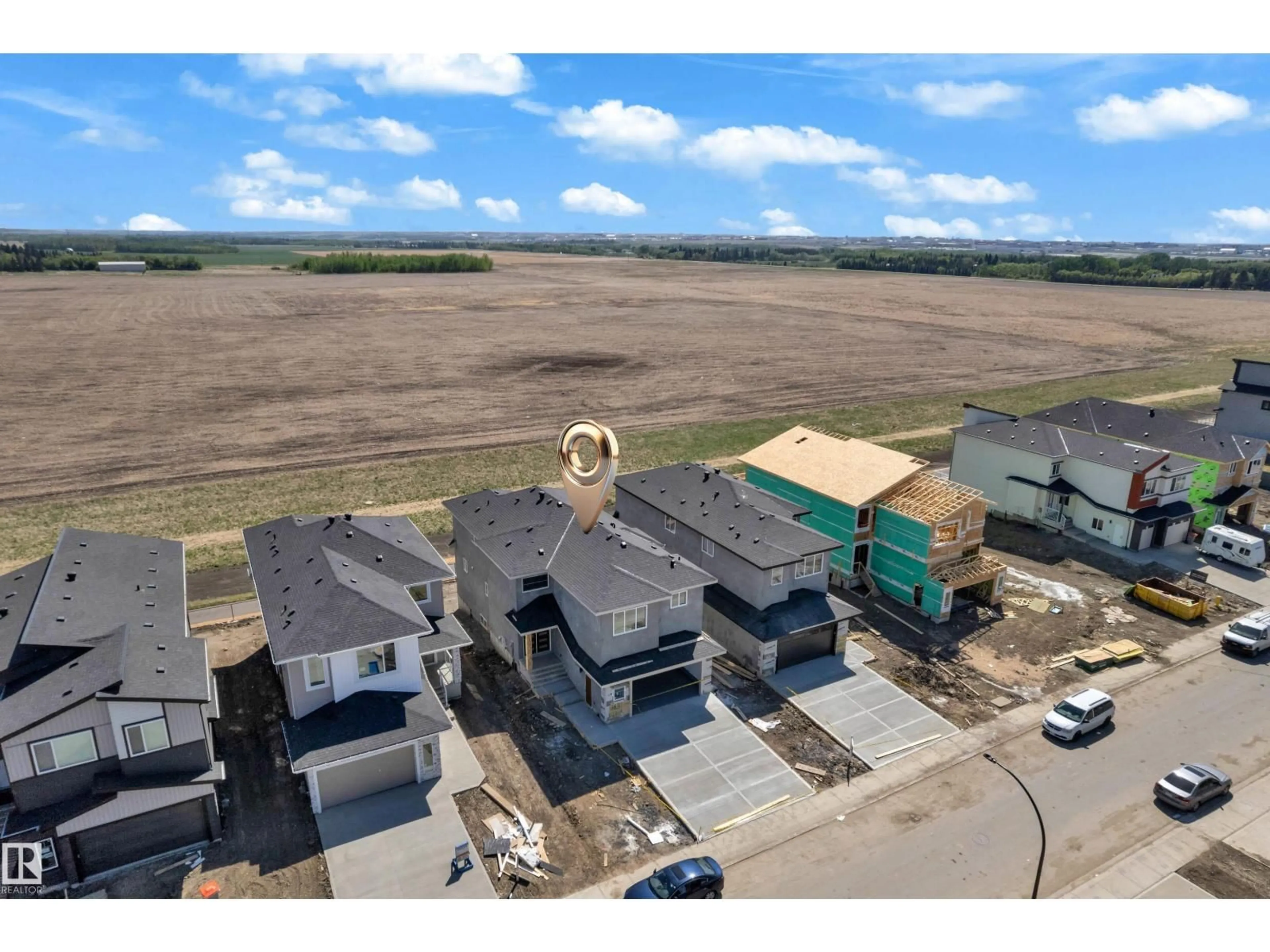 A pic from outside/outdoor area/front of a property/back of a property/a pic from drone, building for NE - 2631 64 AVE, Rural Leduc County Alberta T4X0H6
