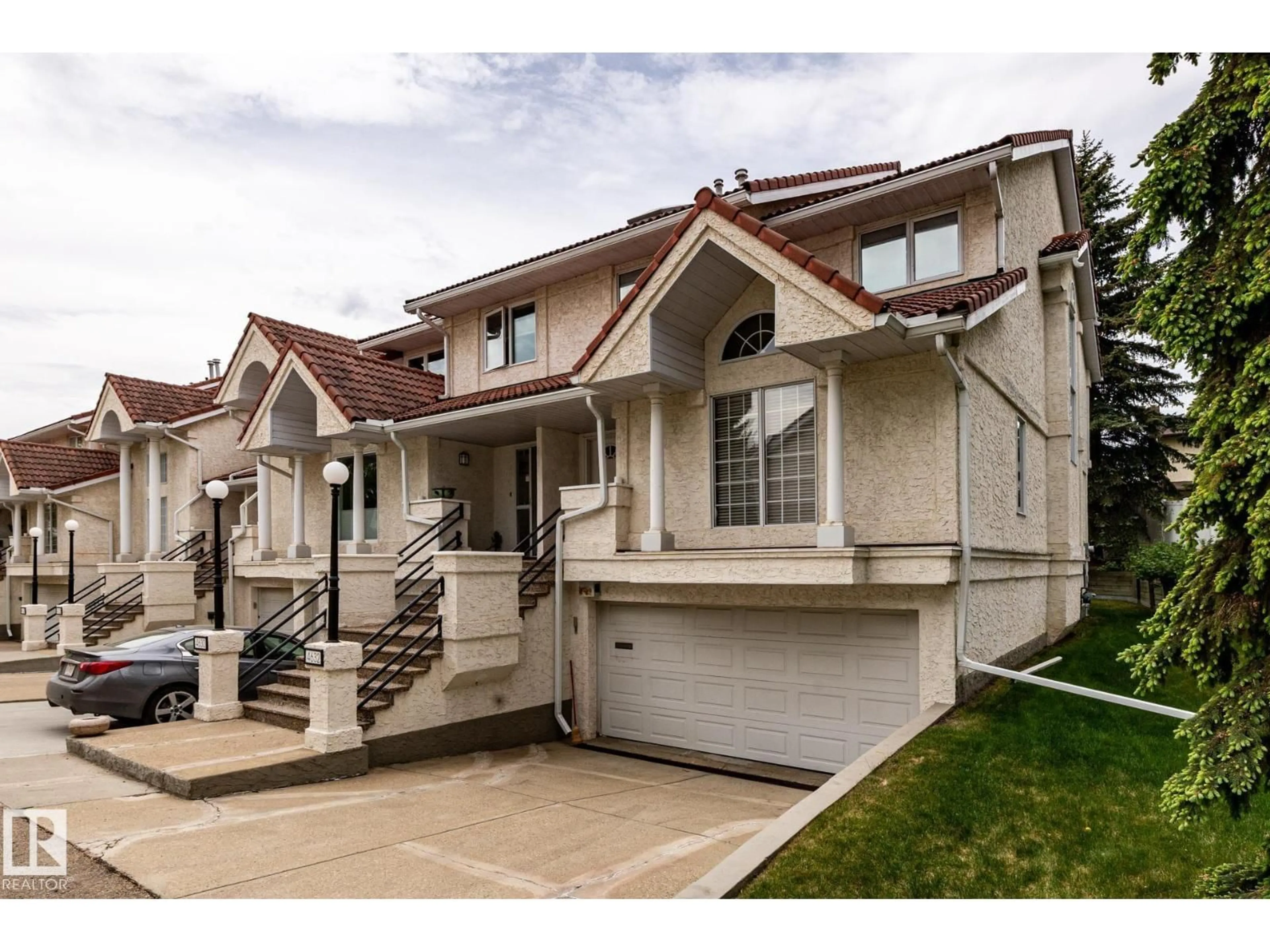 Home with vinyl exterior material, street for NW - 4632 151 ST, Edmonton Alberta T6H5N8