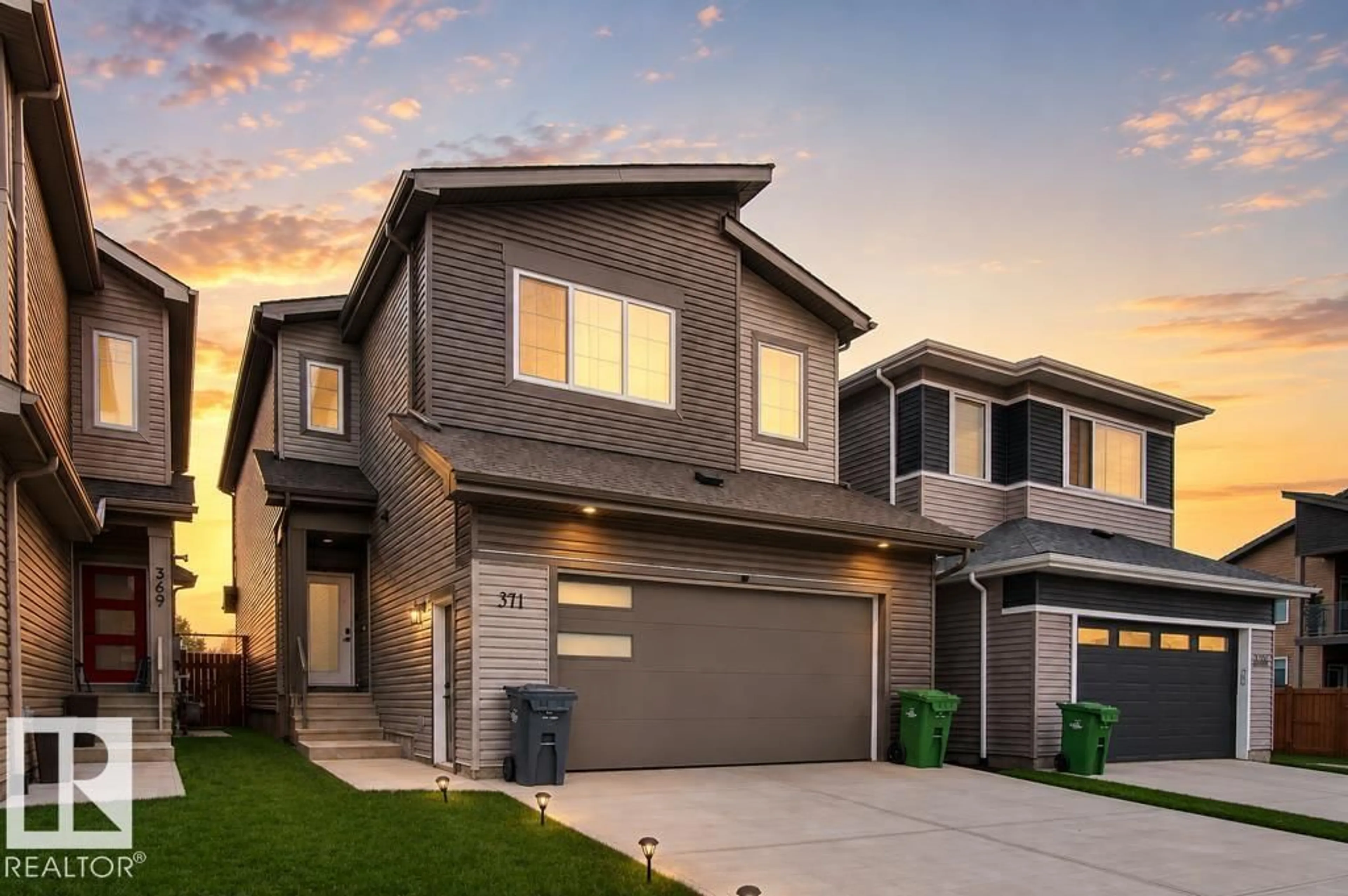 Home with vinyl exterior material, street for 371 BLUFF CV, Leduc Alberta T9E1M9