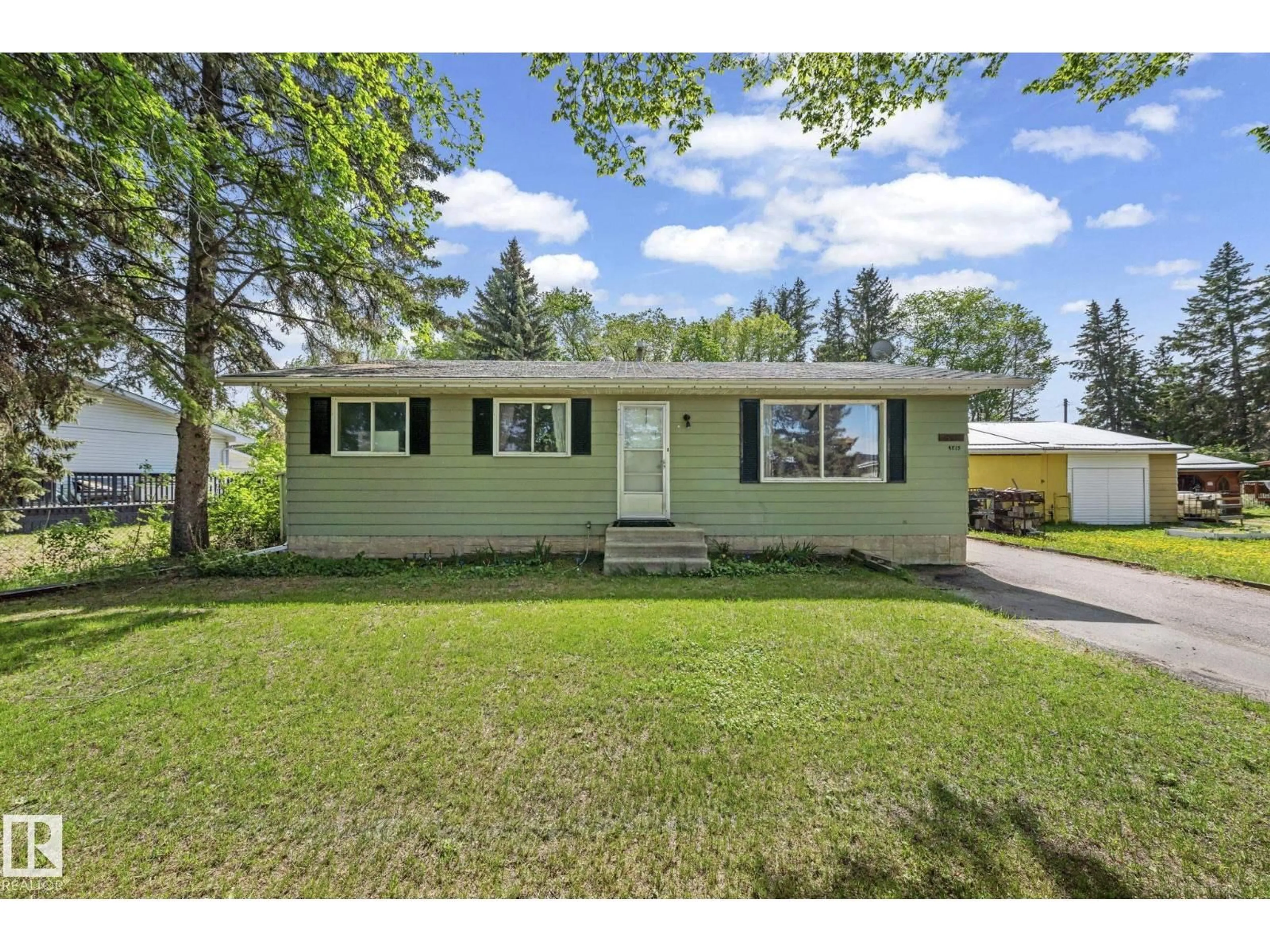 Home with vinyl exterior material, street for 4819 51 ST, Bon Accord Alberta T0A0K0
