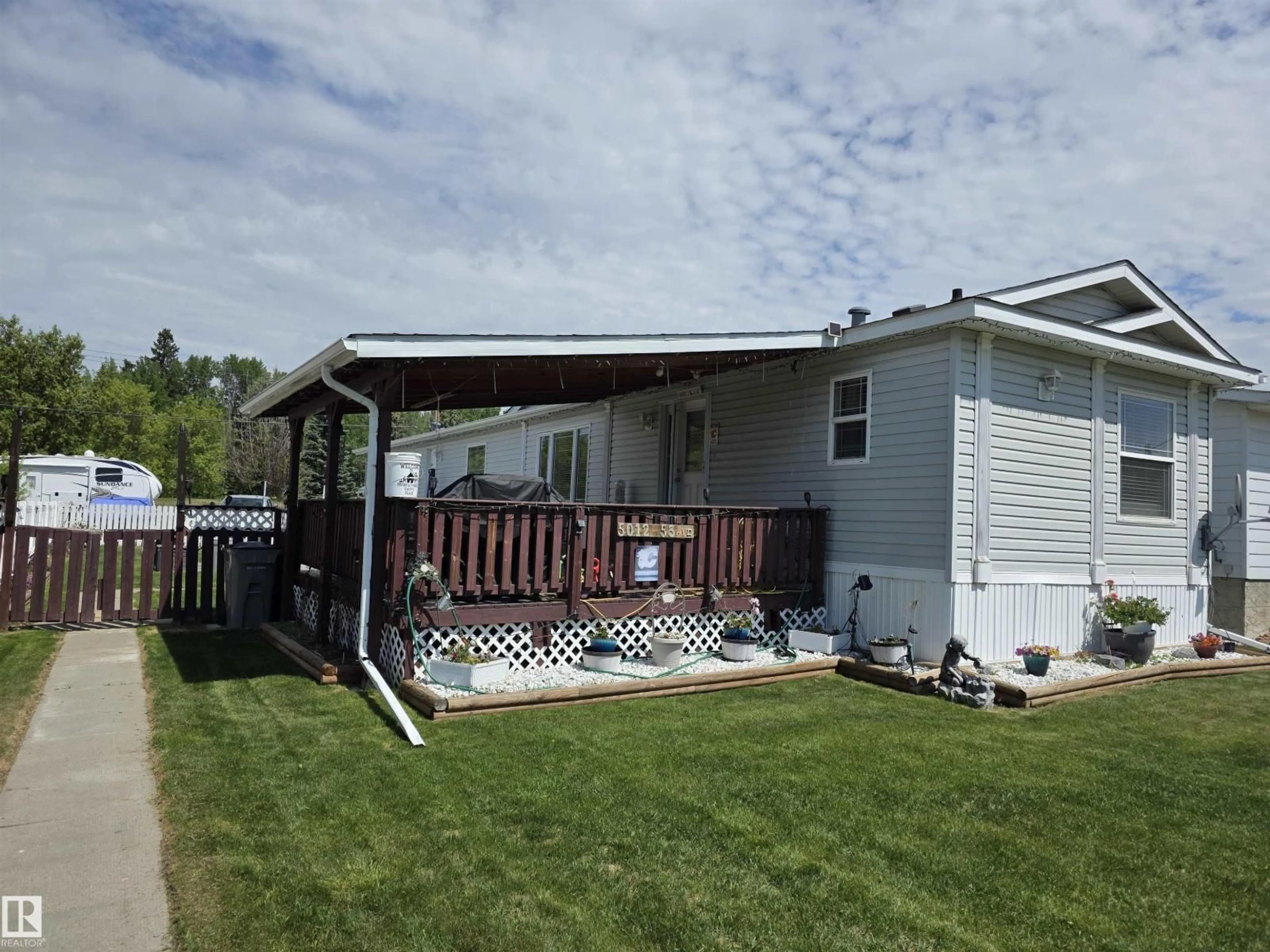 Home with vinyl exterior material, water/lake/river/ocean view for 5012 53 AVE, Breton Alberta T0C0P0