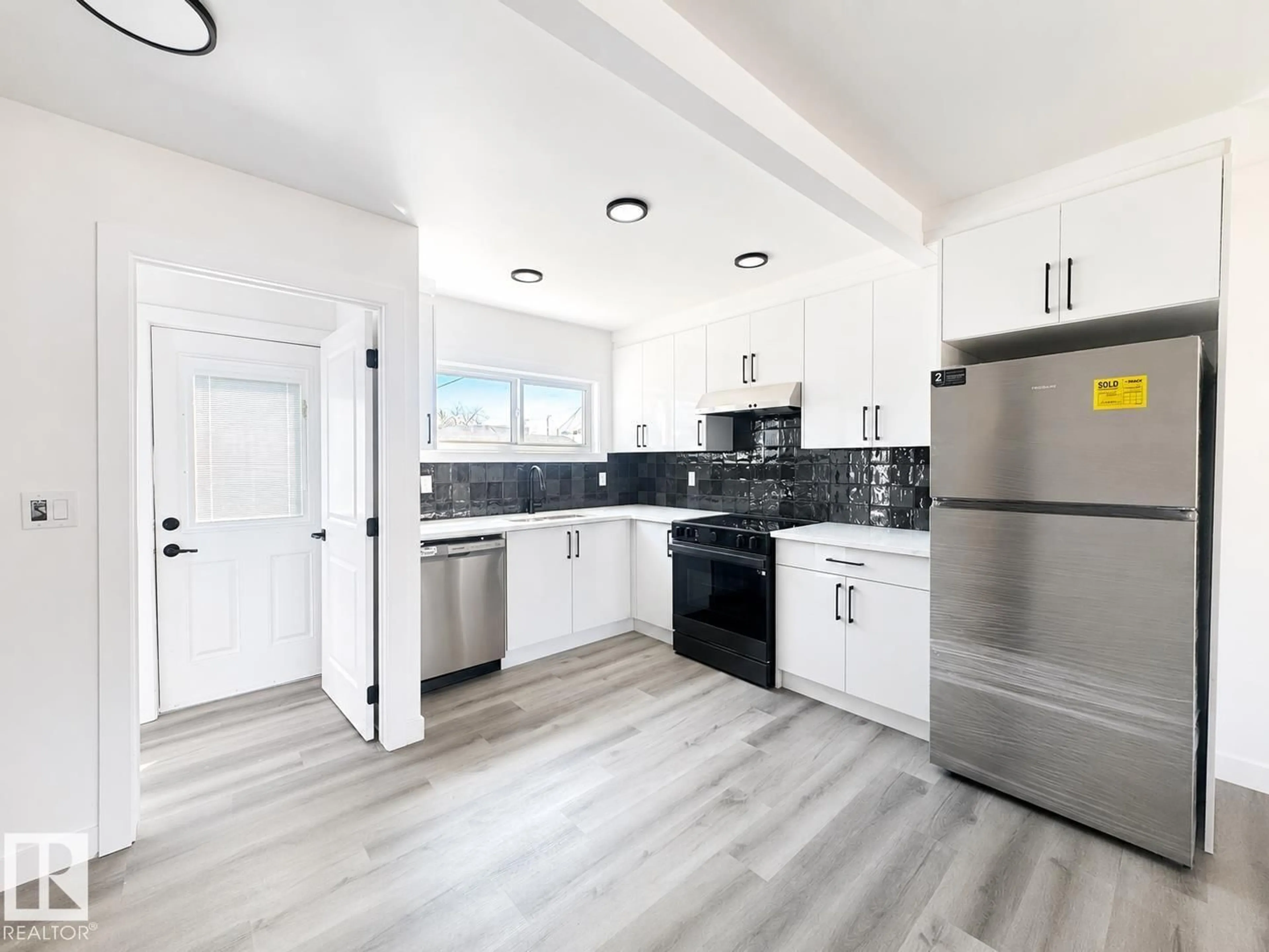 Open concept kitchen, unknown for 12717 116 ST, Edmonton Alberta T5E5H1