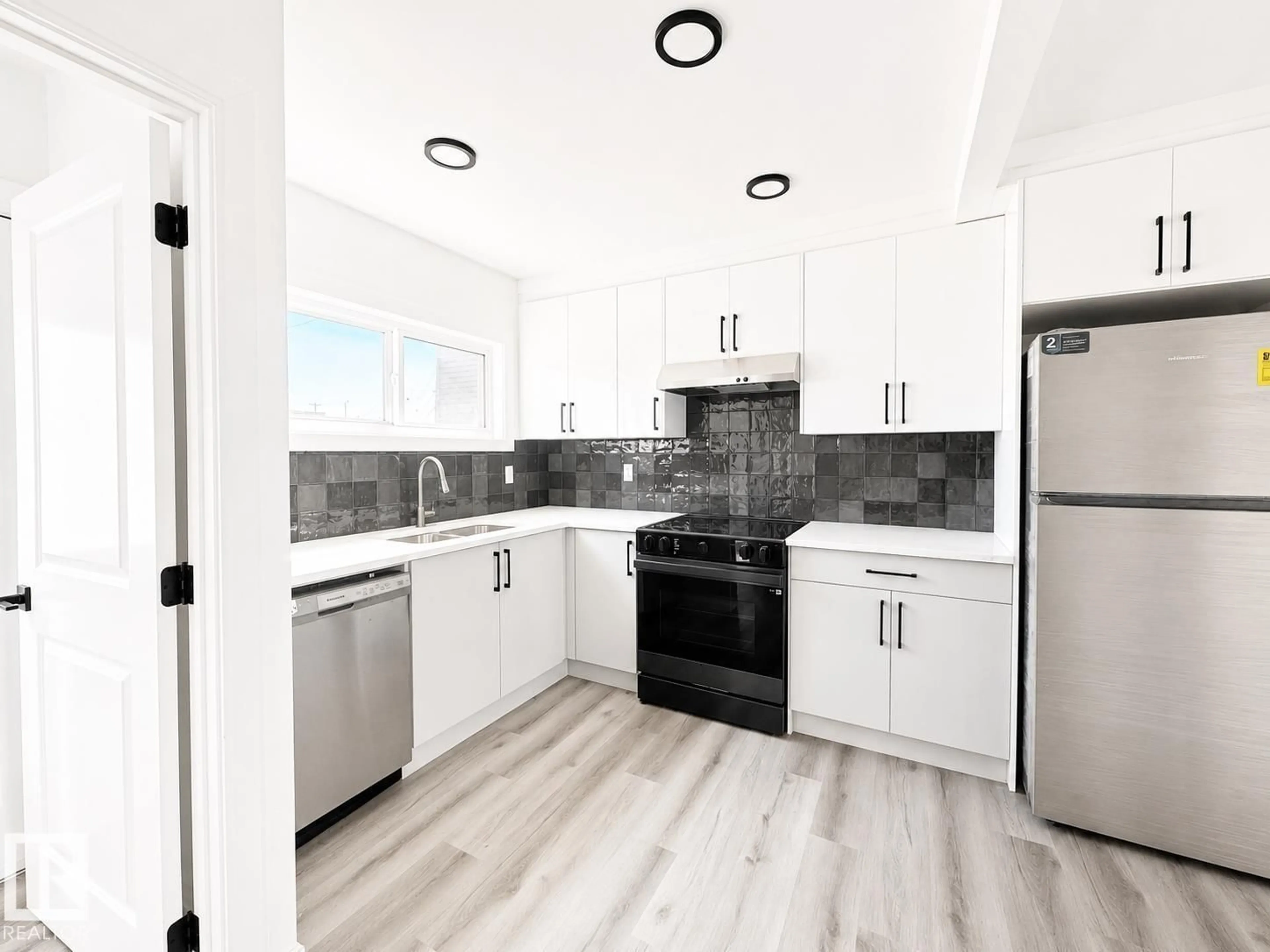 Open concept kitchen, unknown for 12717 116 ST, Edmonton Alberta T5E5H1