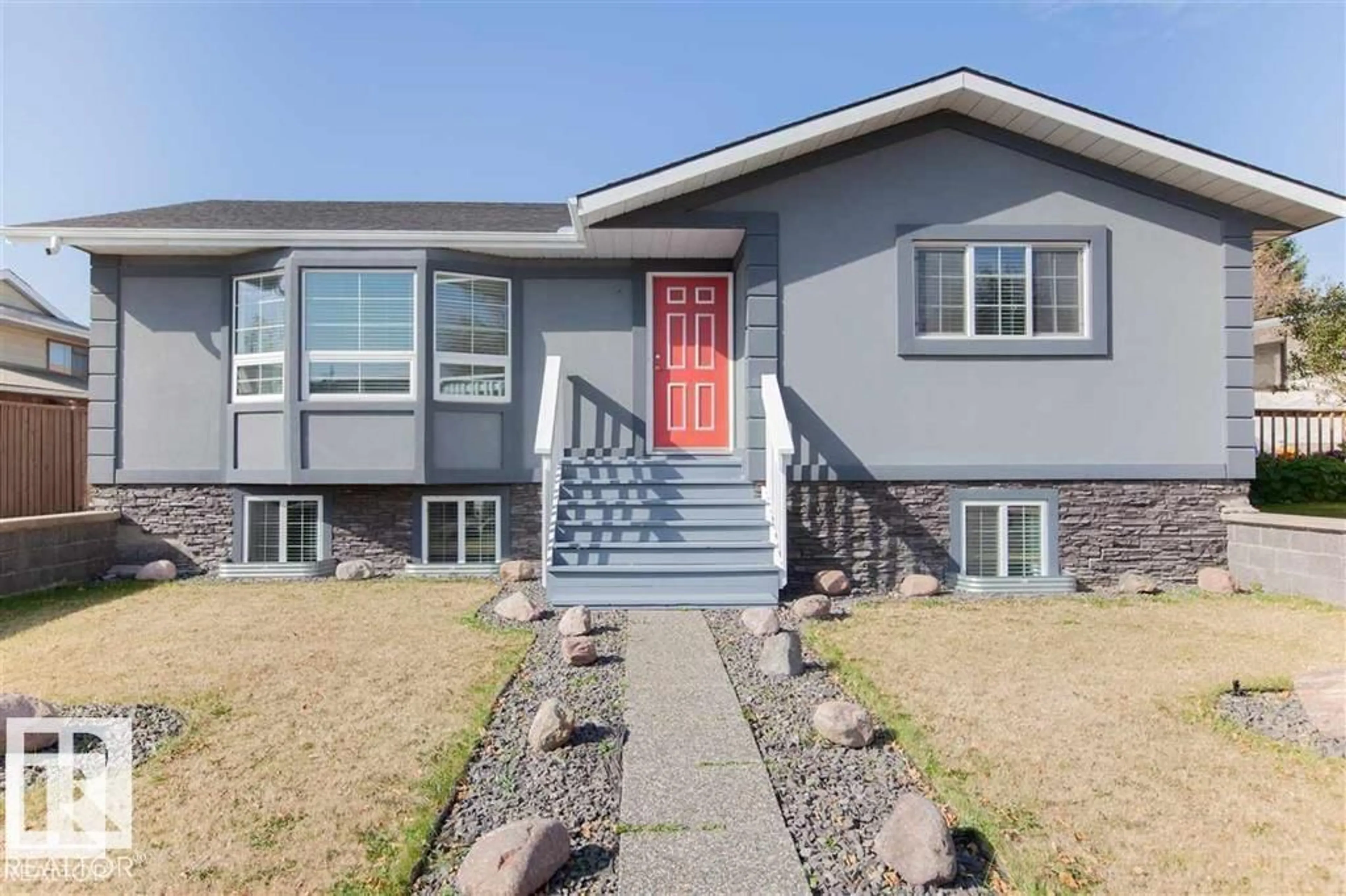 Home with vinyl exterior material, street for 17208 106 ST, Edmonton Alberta T5X3G8
