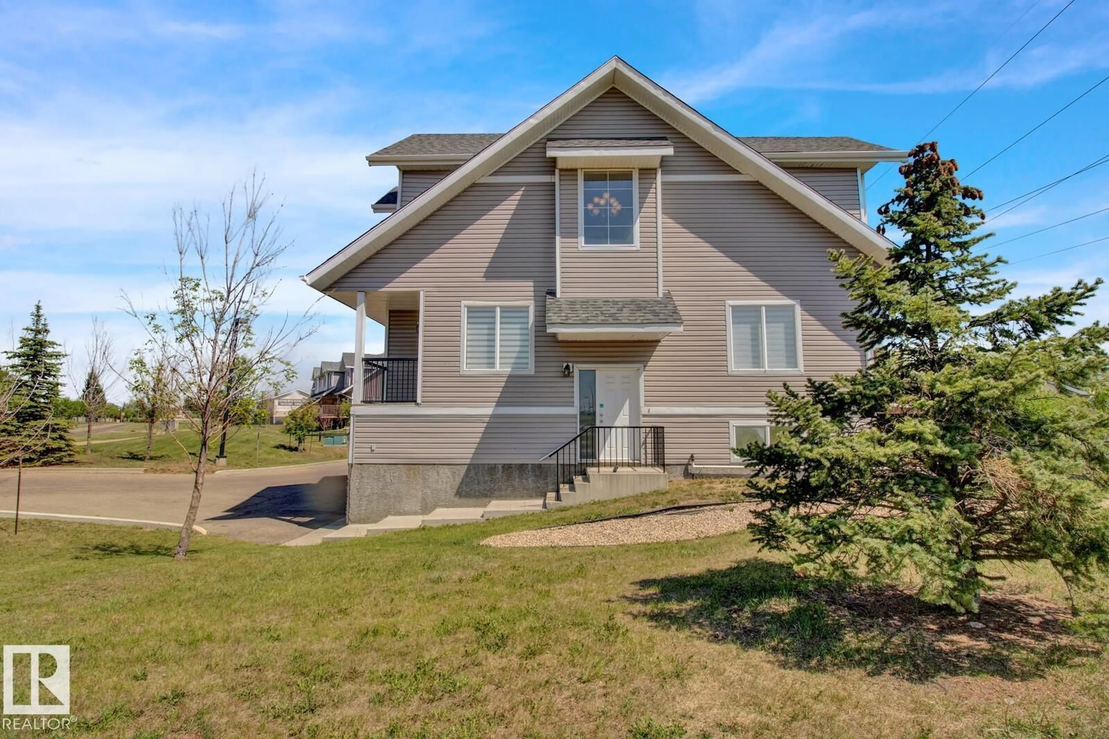Home with vinyl exterior material, street for 13215 - 29 153 AV, Edmonton Alberta T6V0B6