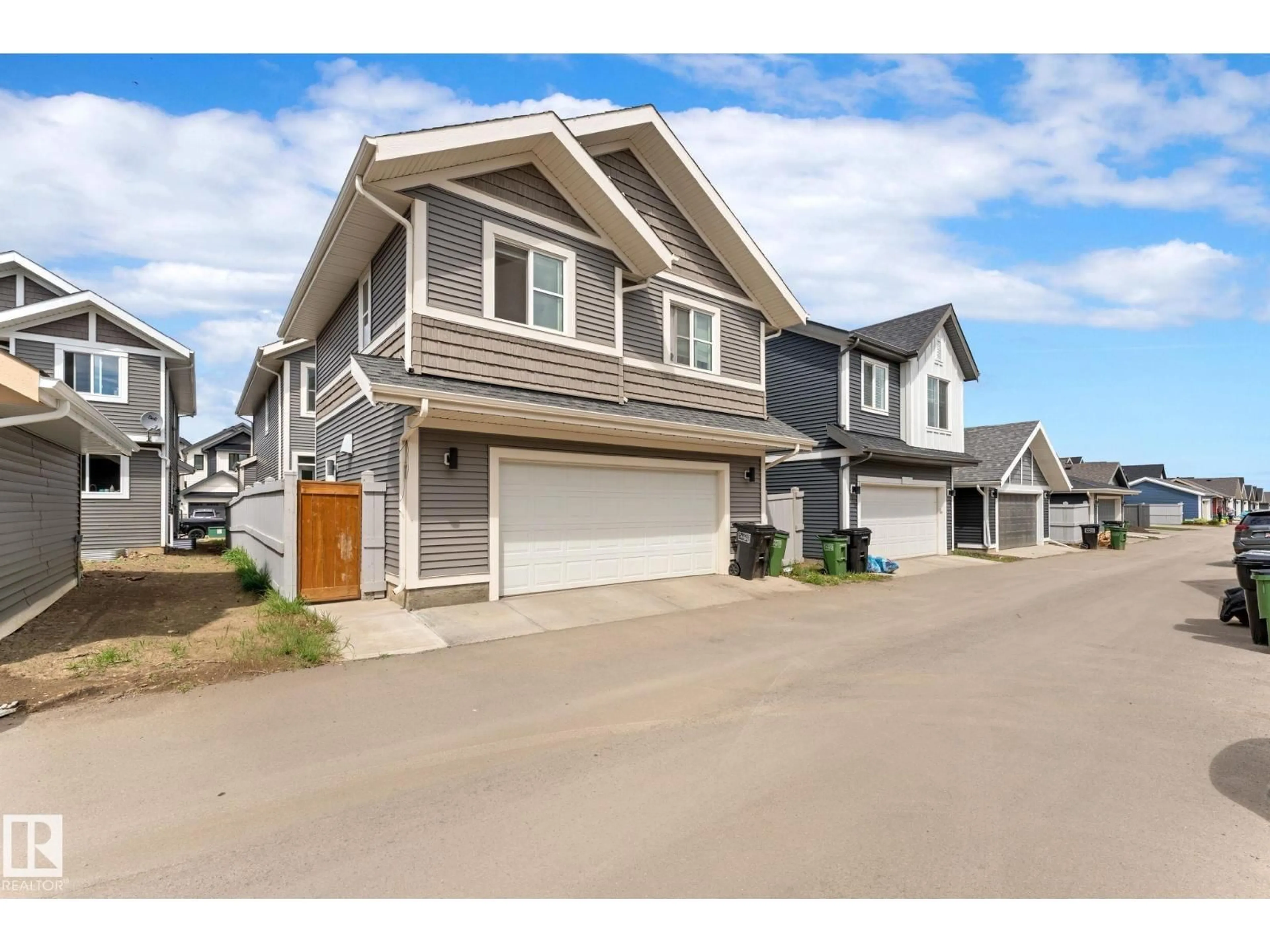 Home with vinyl exterior material, street for 6339 GREENAWAY AV, Edmonton Alberta T5E6Y6