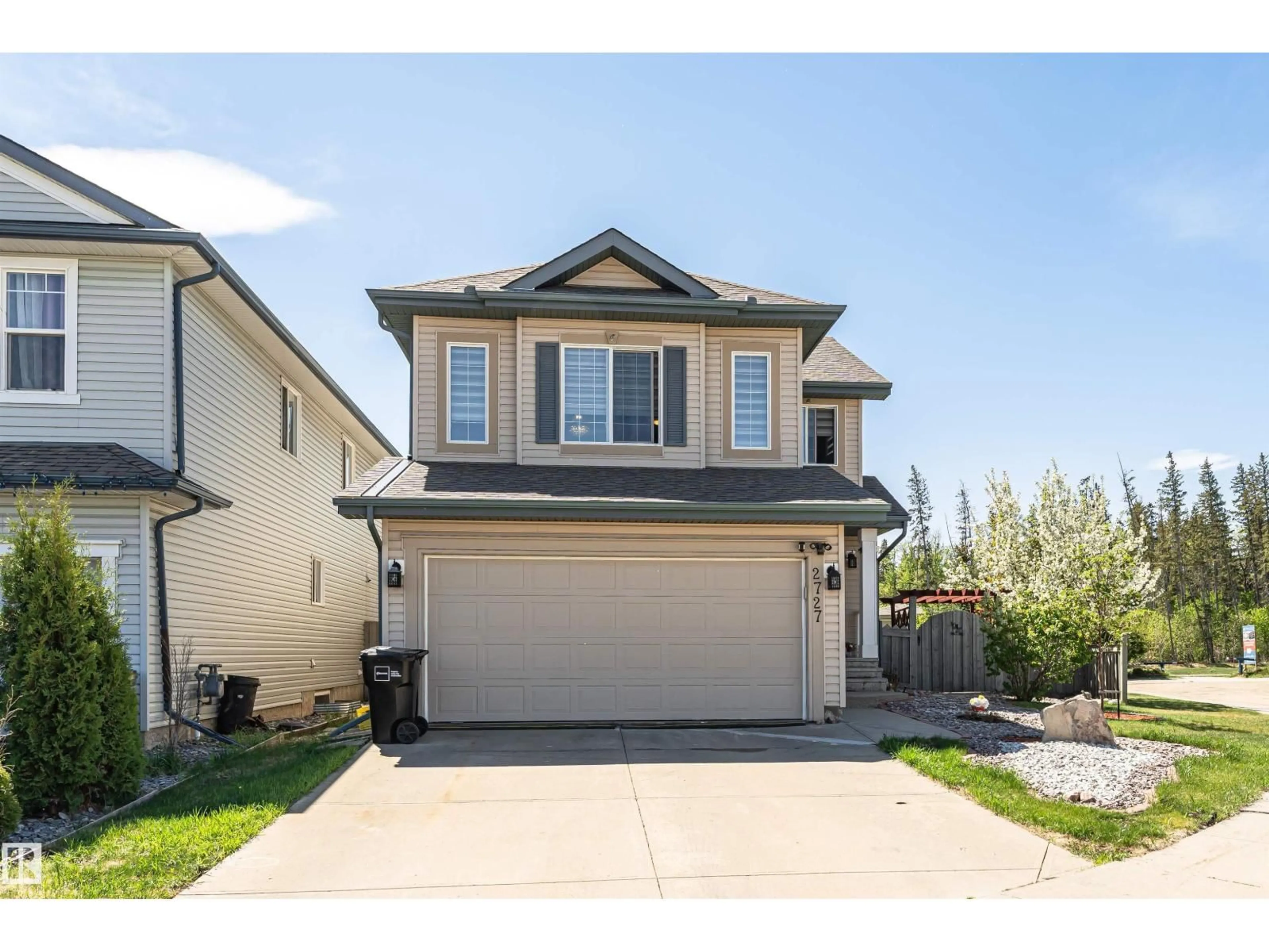 Home with vinyl exterior material, street for 2727 MILES PL, Edmonton Alberta T6W0B3