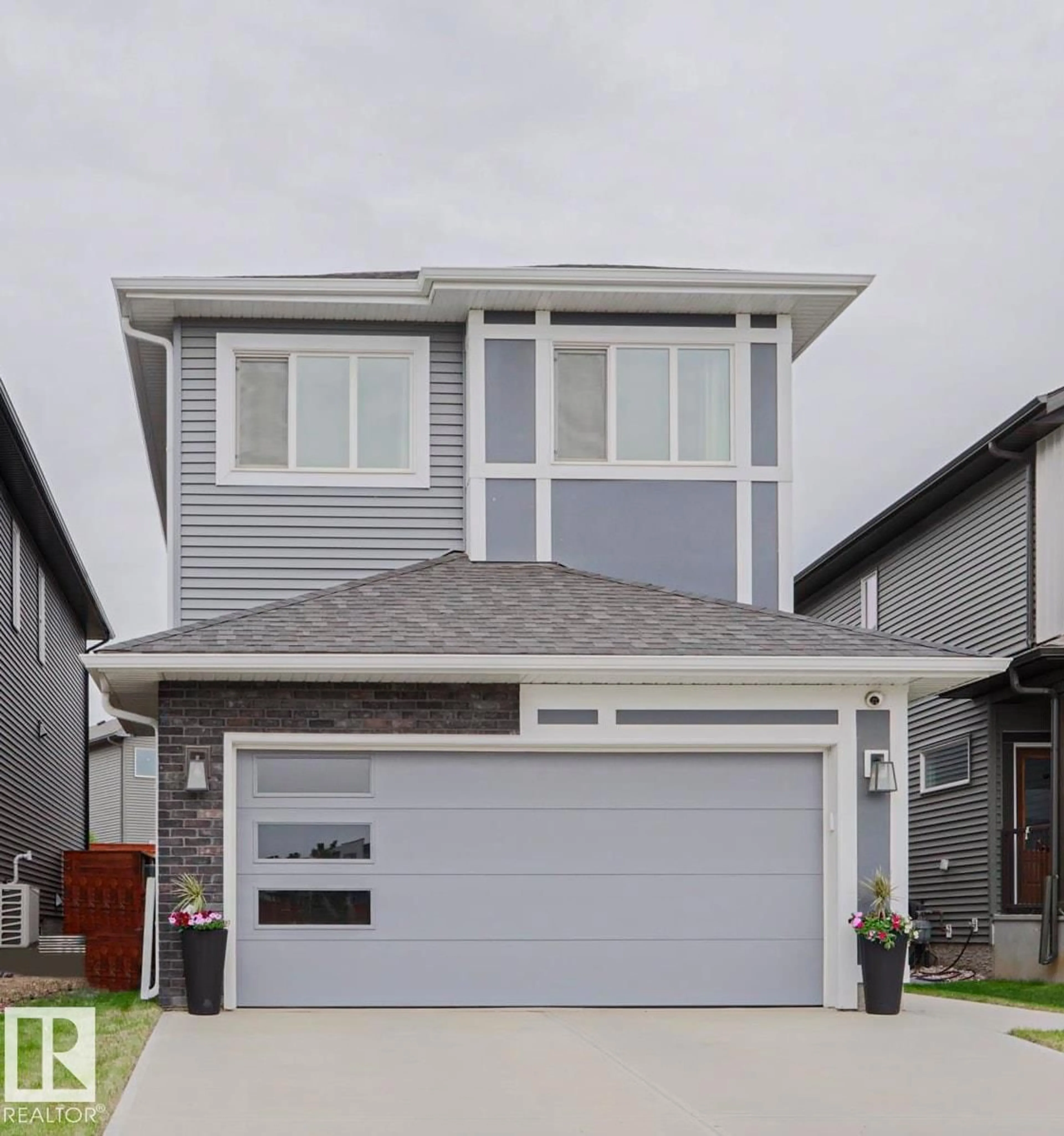 Home with vinyl exterior material, street for 28 ROSEWOOD WY, St. Albert Alberta T8N7Y8