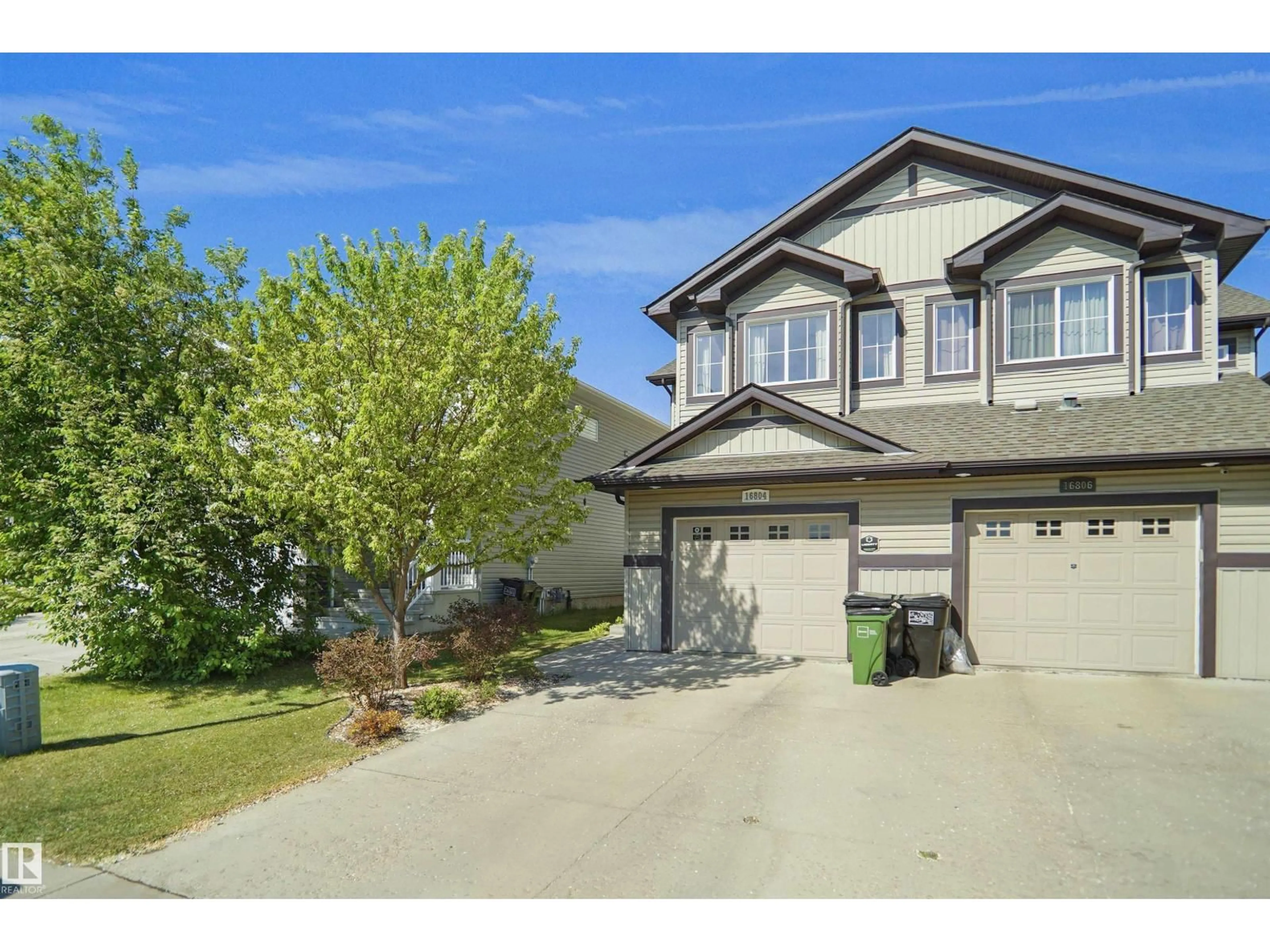 Home with vinyl exterior material, street for 16804 53 ST, Edmonton Alberta T5Y0R6