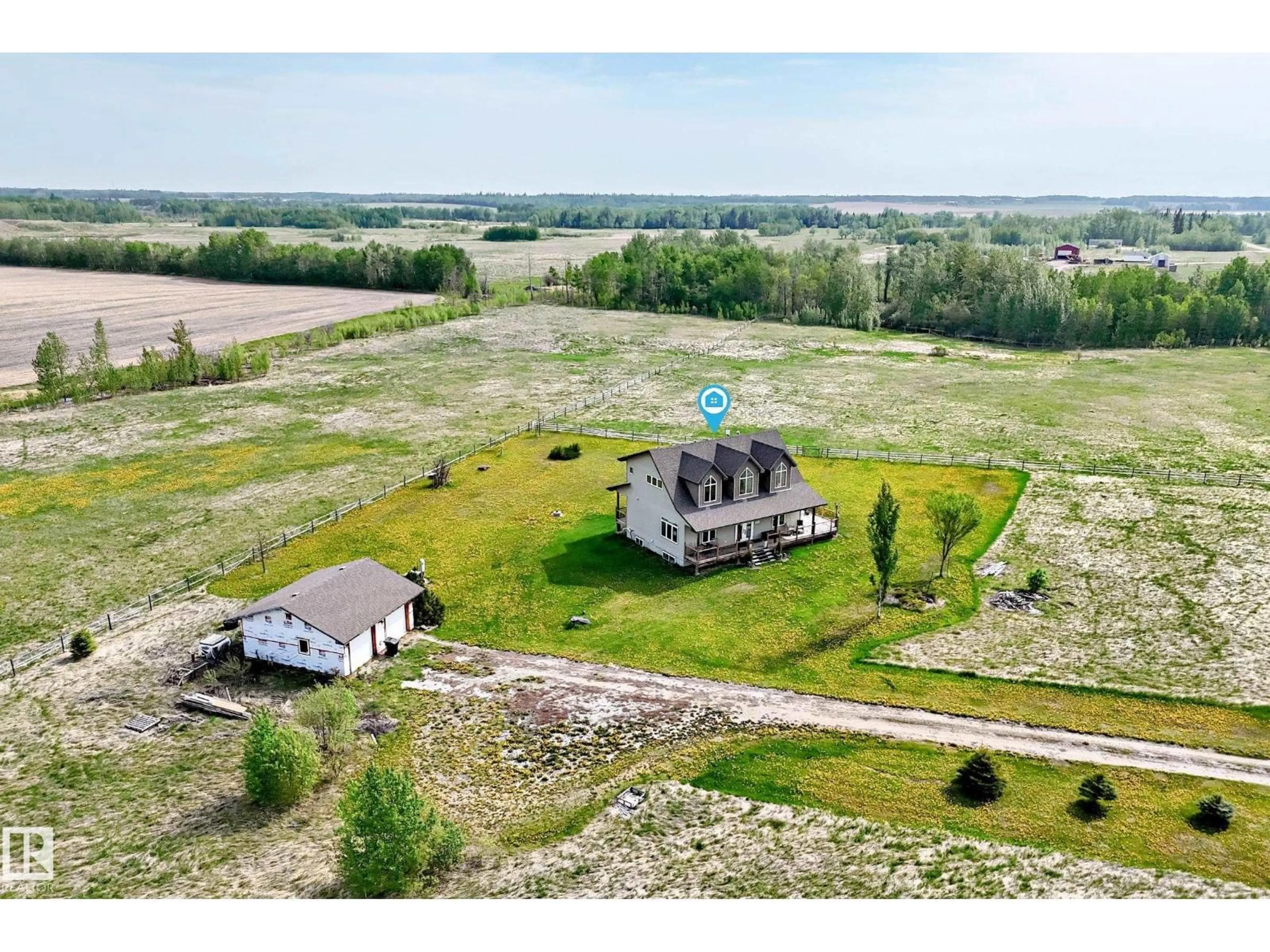 A pic from outside/outdoor area/front of a property/back of a property/a pic from drone, building for 2420 TWP ROAD 555, Rural Lac Ste. Anne County Alberta T0E1J0
