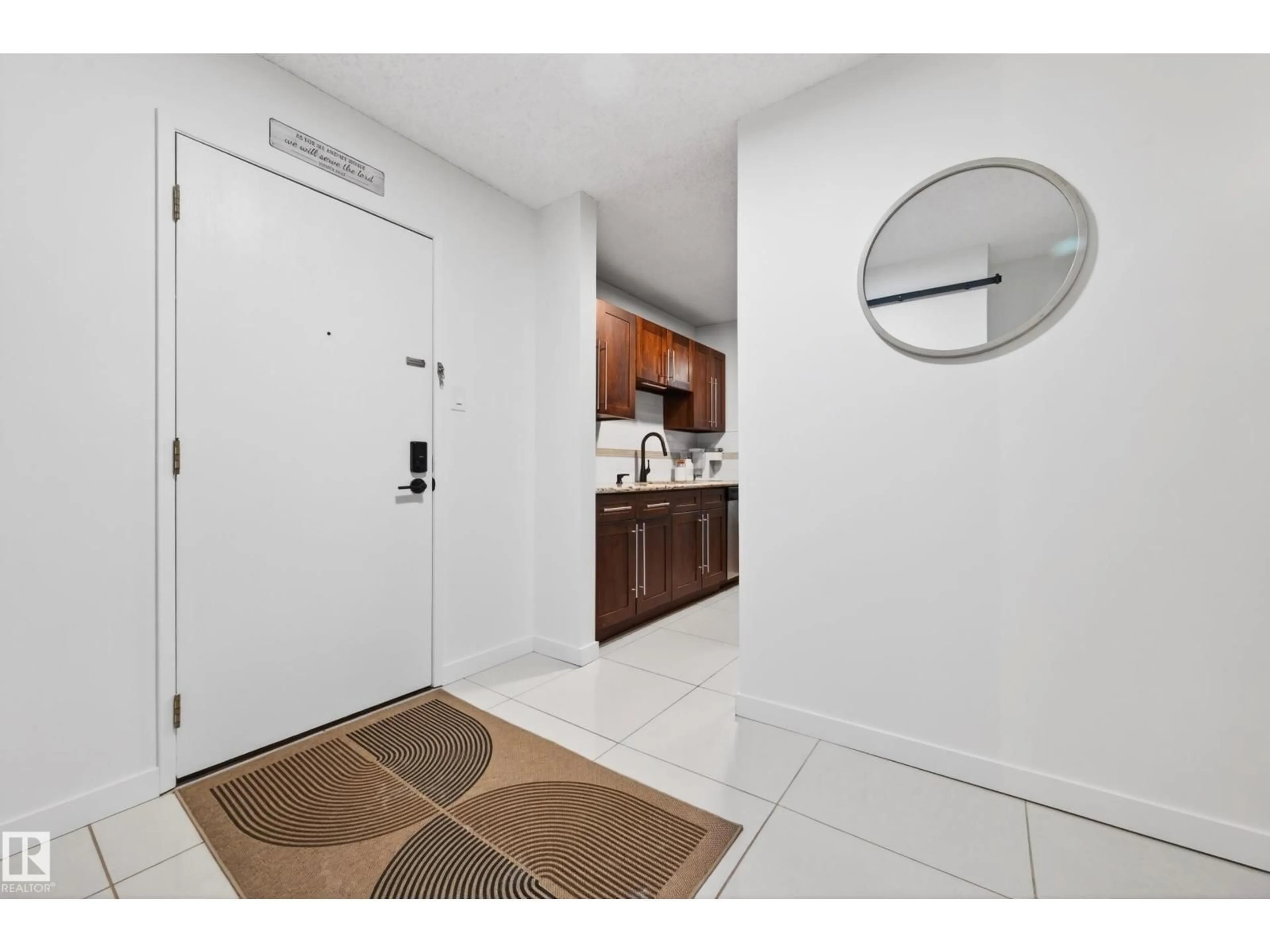 Indoor entryway for #312 - 14811 51 AV, Edmonton Alberta T6H5G4