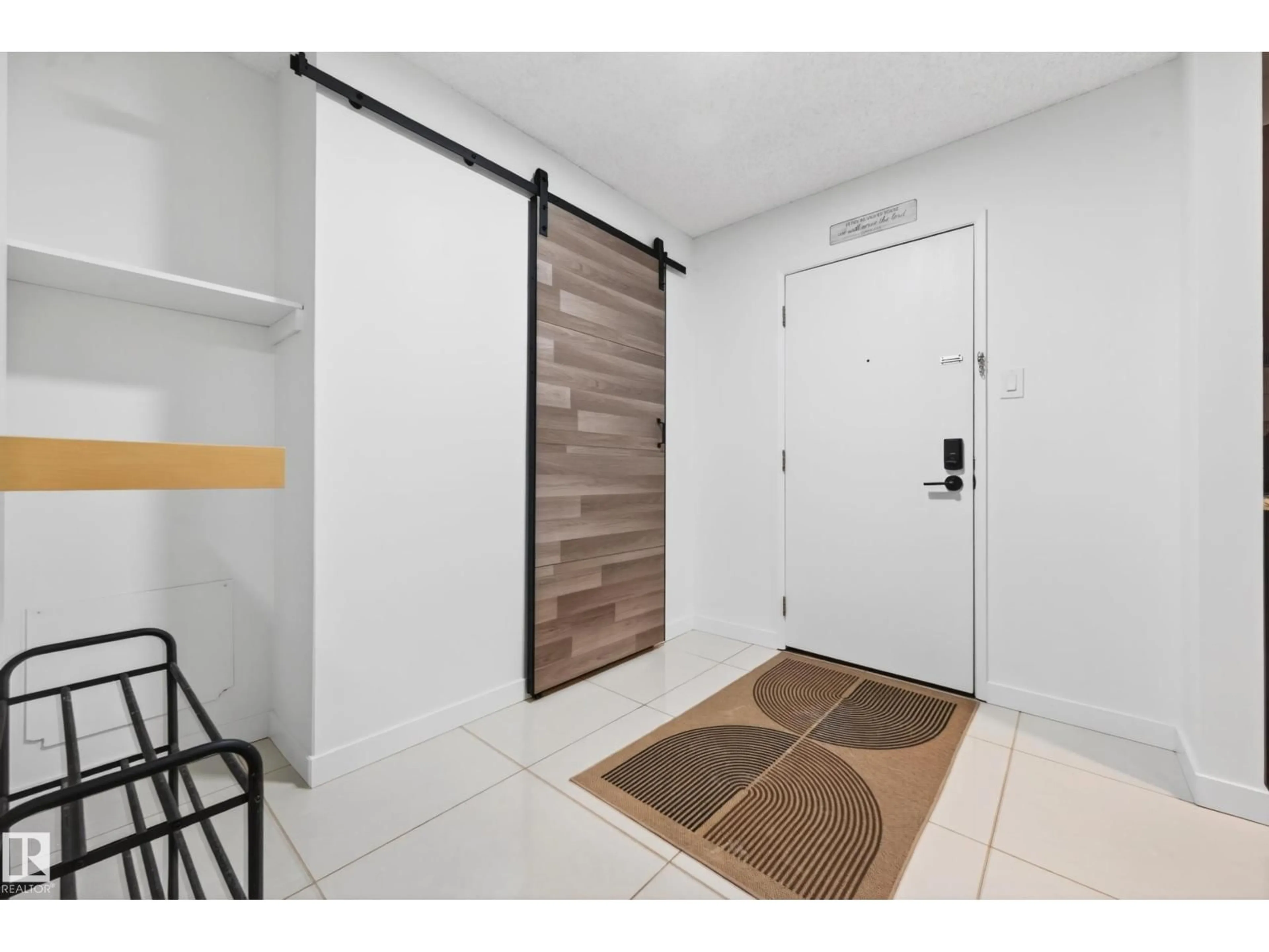 Indoor entryway for #312 - 14811 51 AV, Edmonton Alberta T6H5G4