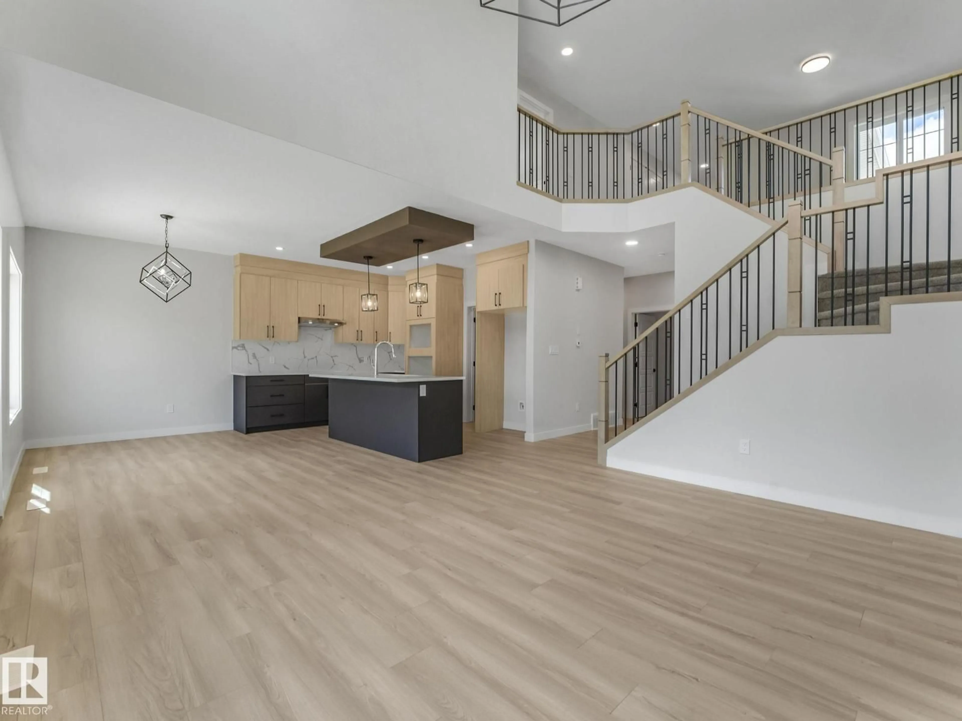 Open concept kitchen, wood/laminate floor for 11 DALQUIST BAY, Leduc Alberta T9E1N7
