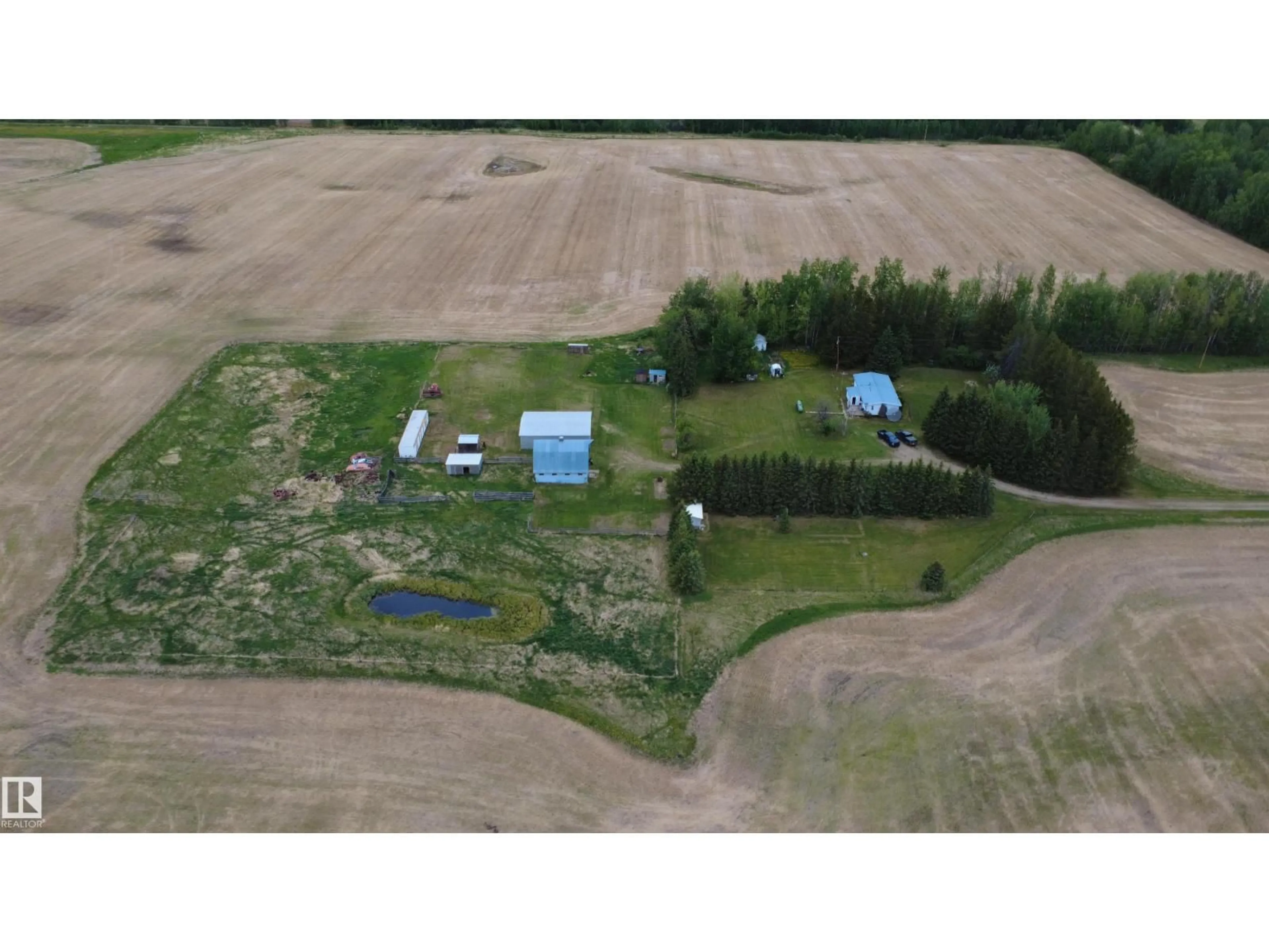 A pic from outside/outdoor area/front of a property/back of a property/a pic from drone, unknown for 53024A RR 84, Rural Yellowhead Alberta T0E2M0