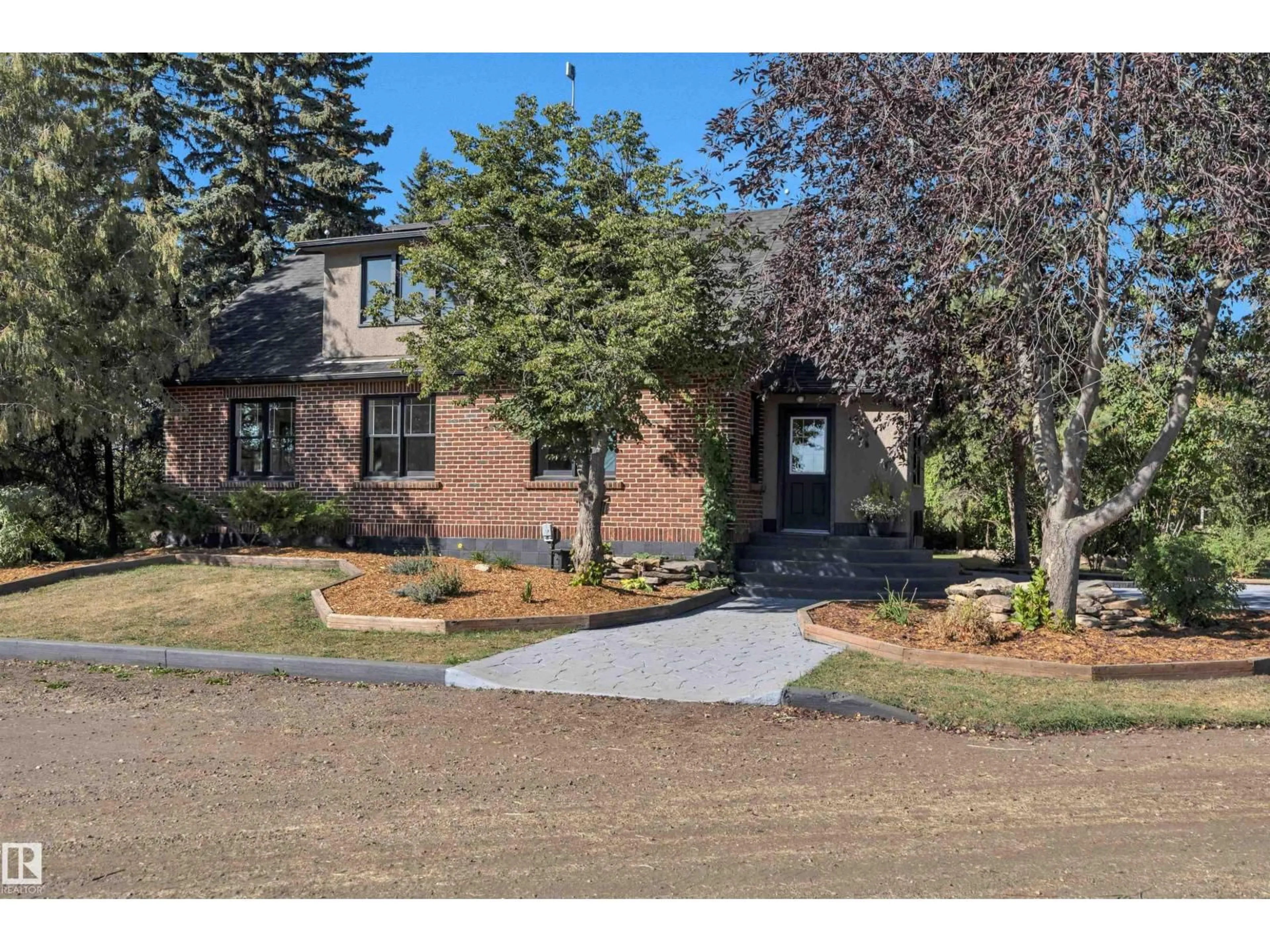 Home with brick exterior material, street for 473025 RANGE ROAD 262, Rural Wetaskiwin County Alberta T4N2A3