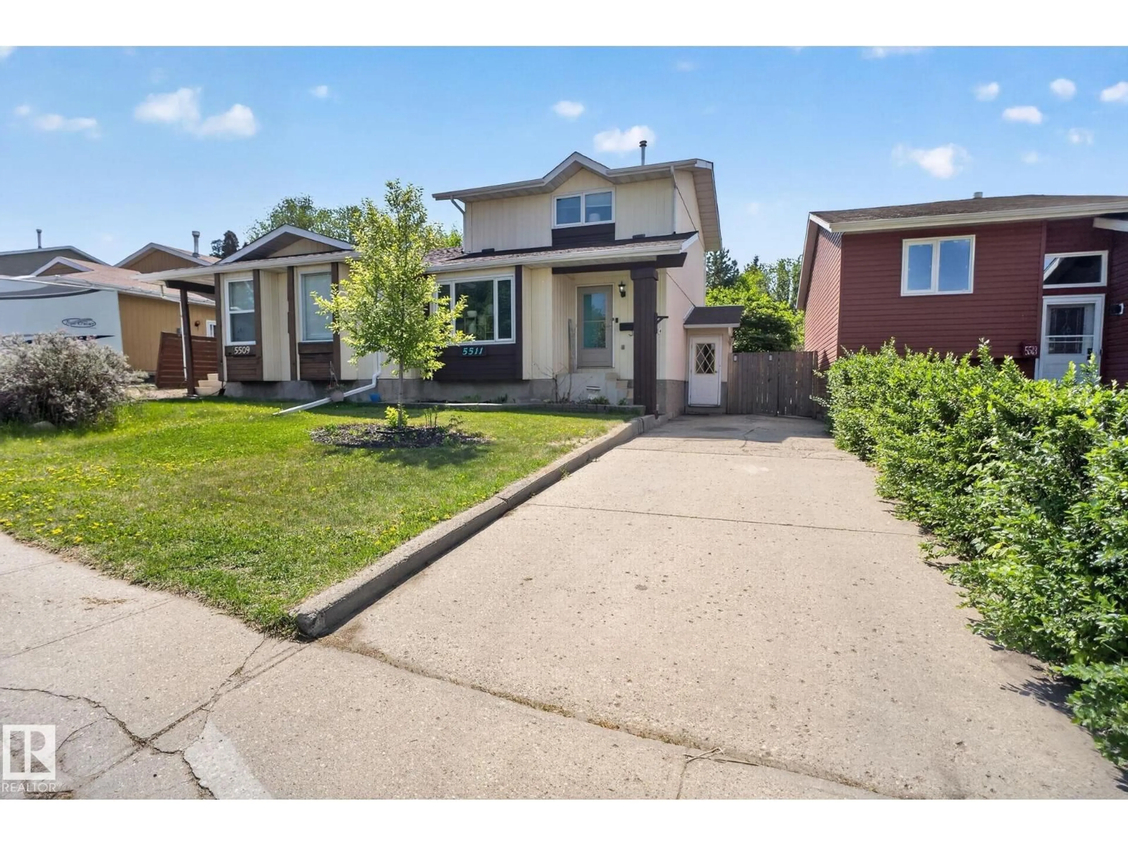 A pic from outside/outdoor area/front of a property/back of a property/a pic from drone, street for 5511 51 AV, Beaumont Alberta T4X1E2
