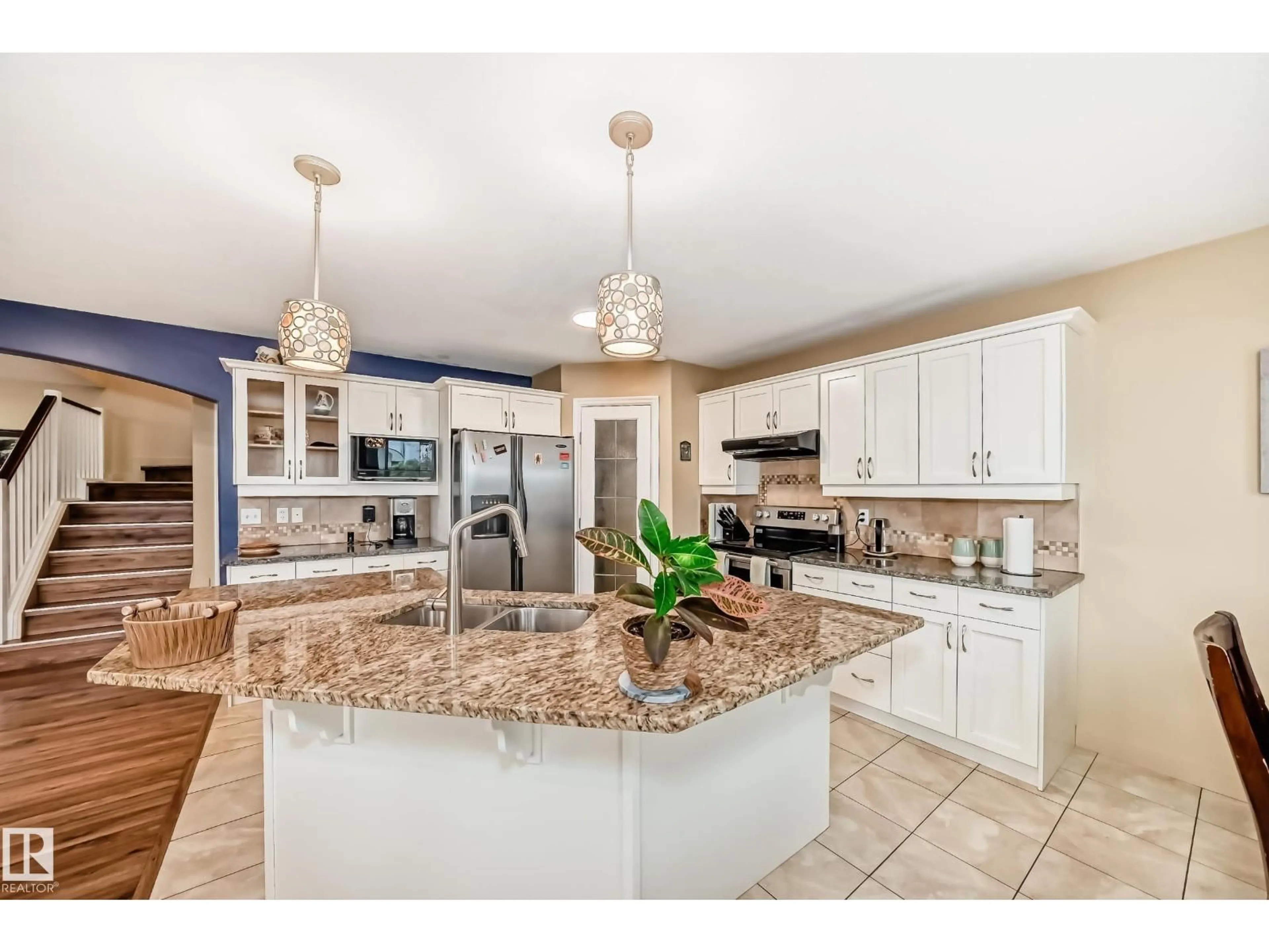 Open concept kitchen, ceramic/tile floor for NW - 15529 47A ST, Edmonton Alberta T5Y0B6