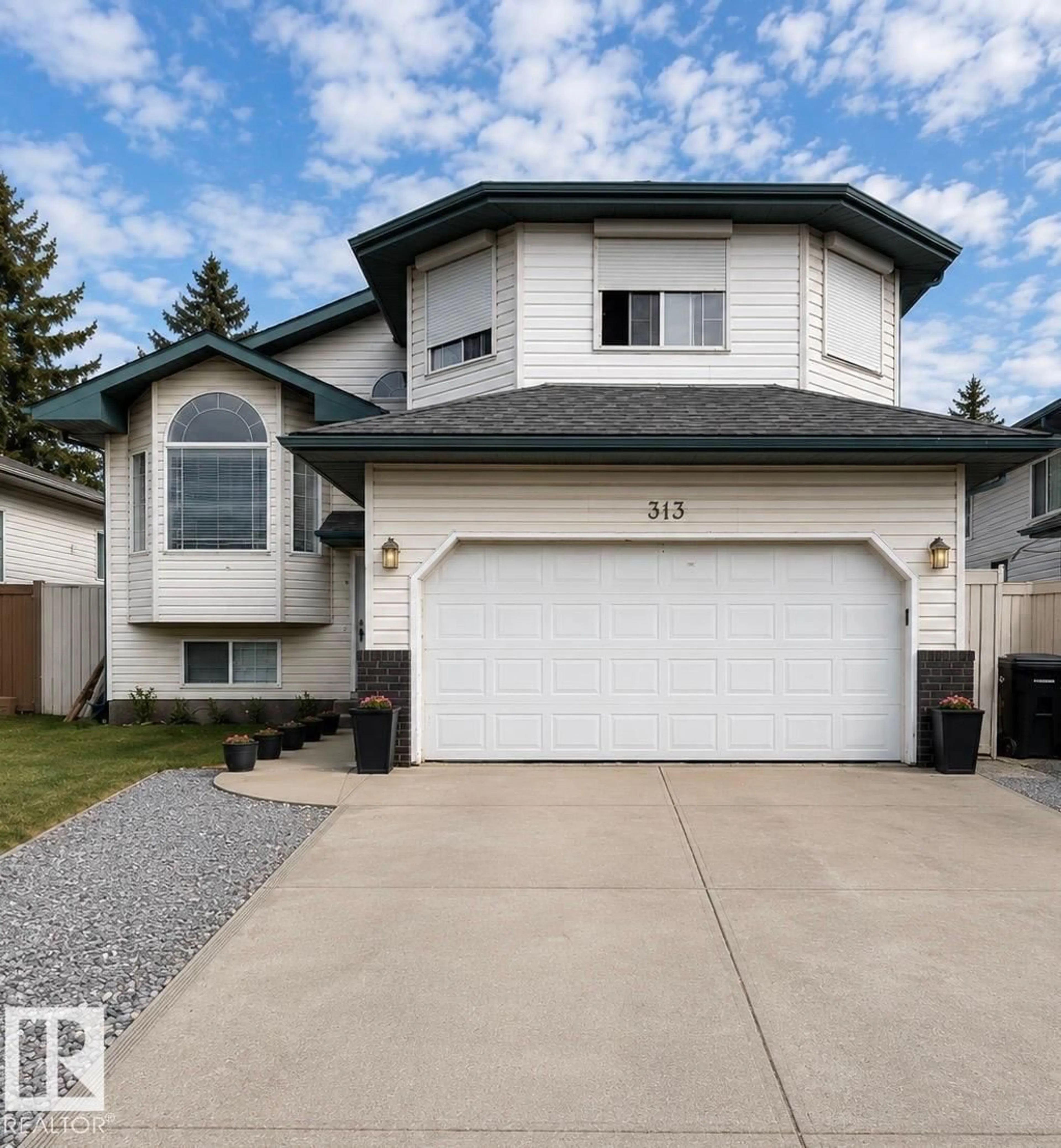 Home with vinyl exterior material, street for 313 JILLINGS CR, Edmonton Alberta T6L6N1