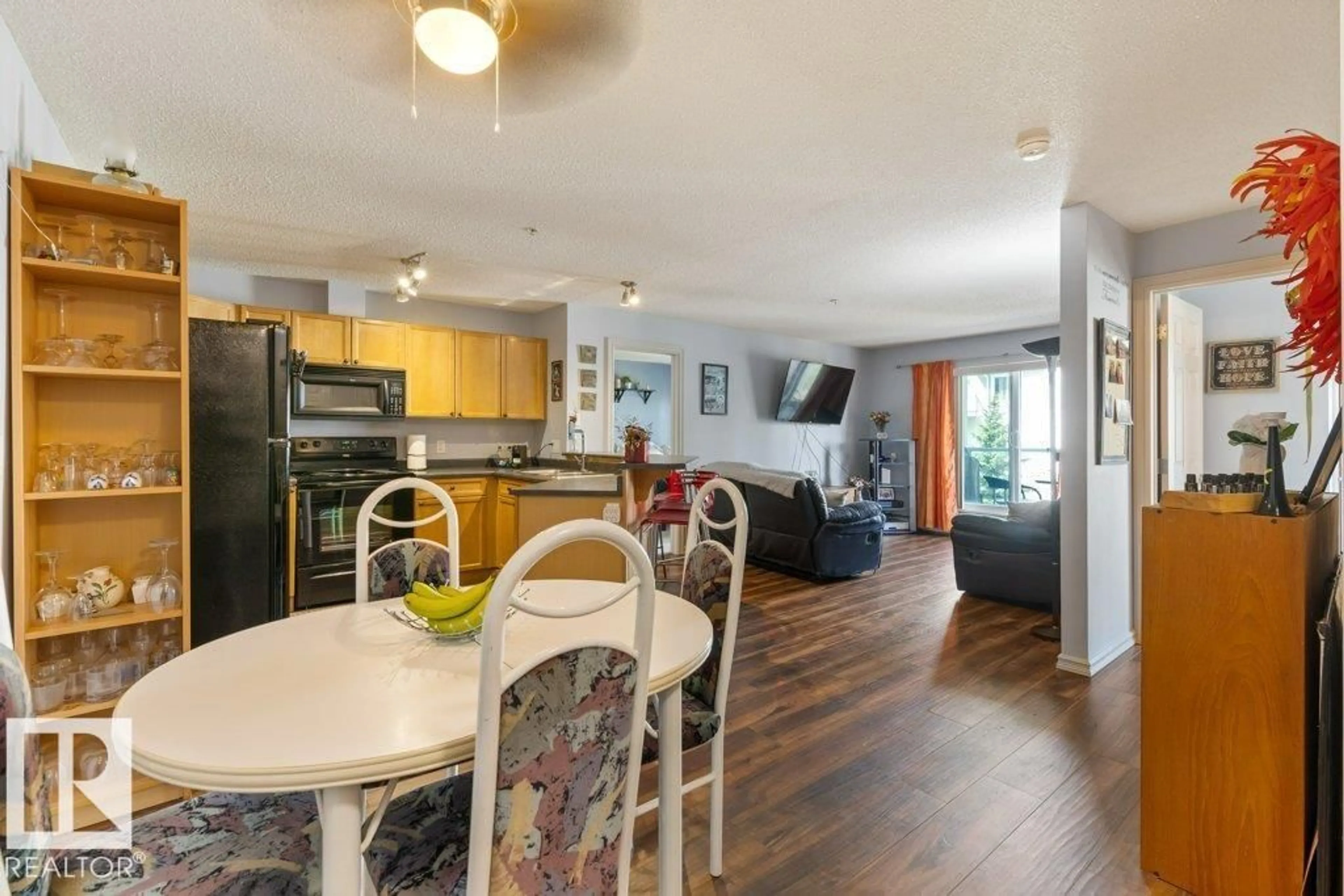 Open concept kitchen, wood/laminate floor for #314 - 13710 150 AV, Edmonton Alberta T6V0B2