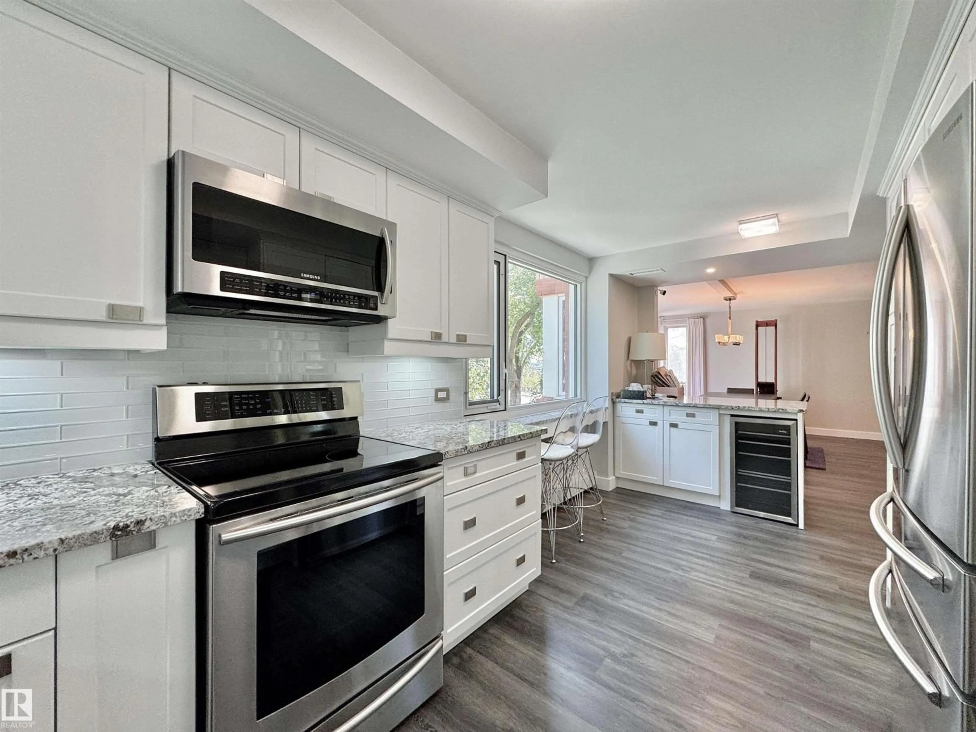 Open concept kitchen, ceramic/tile floor for #201 - 10010 119 ST, Edmonton Alberta T5K1Y8