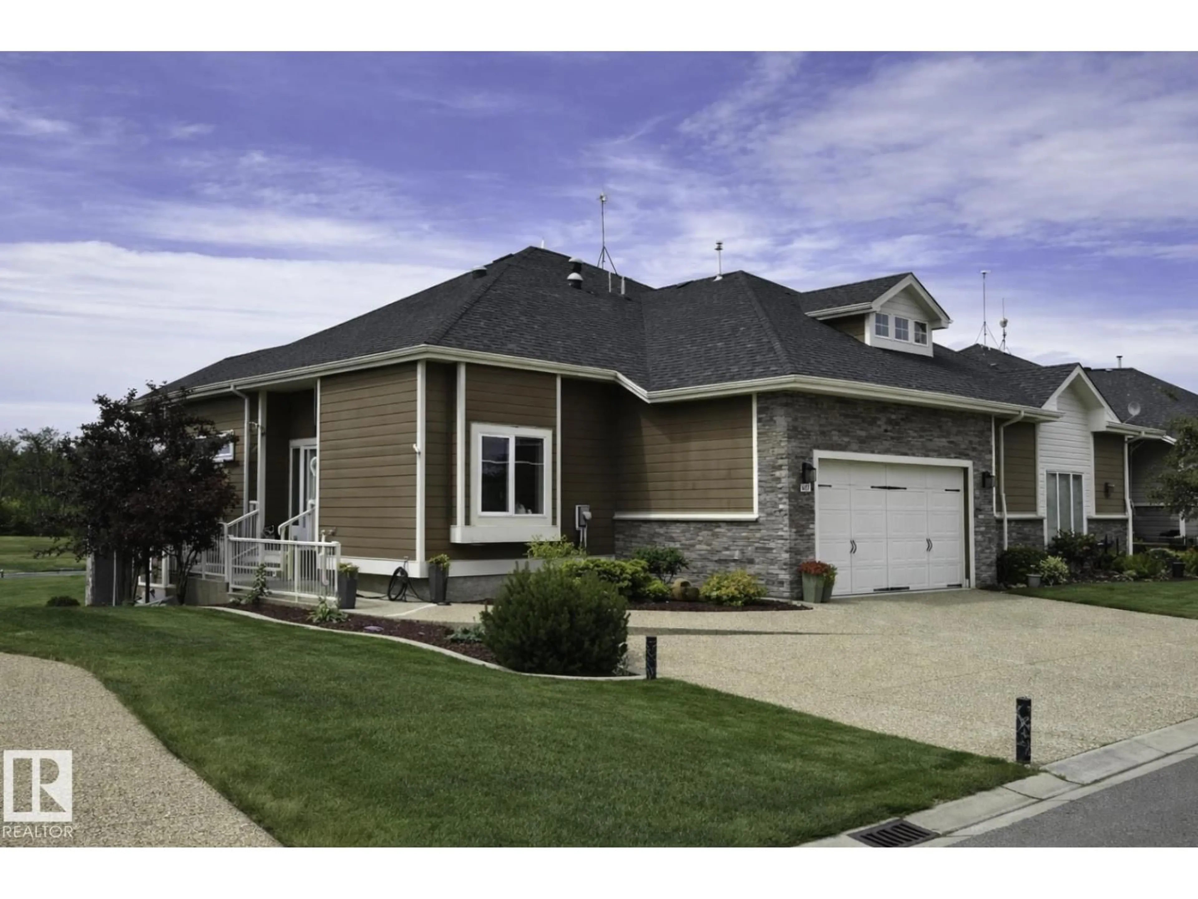Home with vinyl exterior material, street for 51101 - 336 RR 222, Rural Strathcona County Alberta T8C1G9