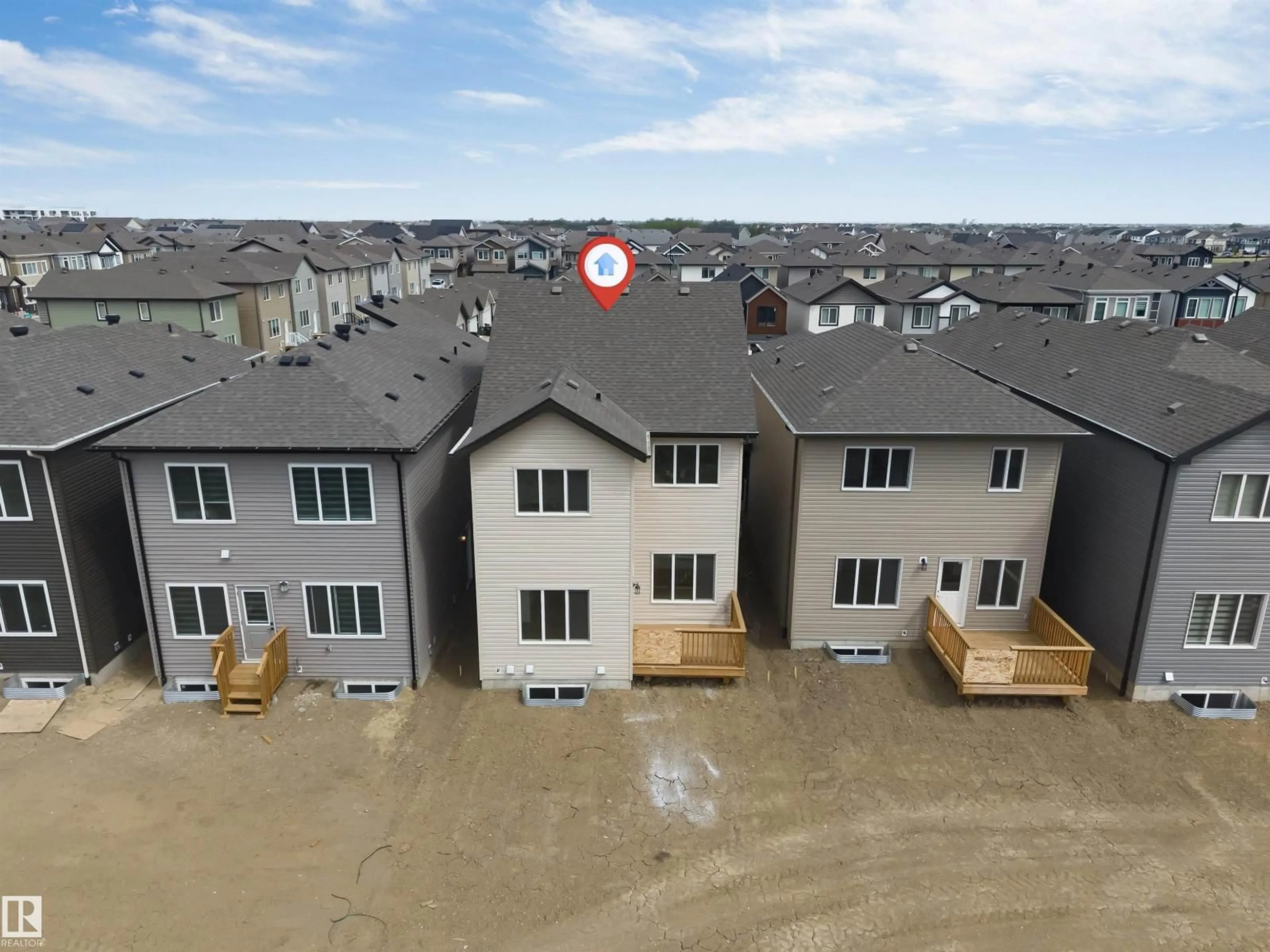A pic from outside/outdoor area/front of a property/back of a property/a pic from drone, unknown for NW - 1972 210 ST, Edmonton Alberta T6M3H7
