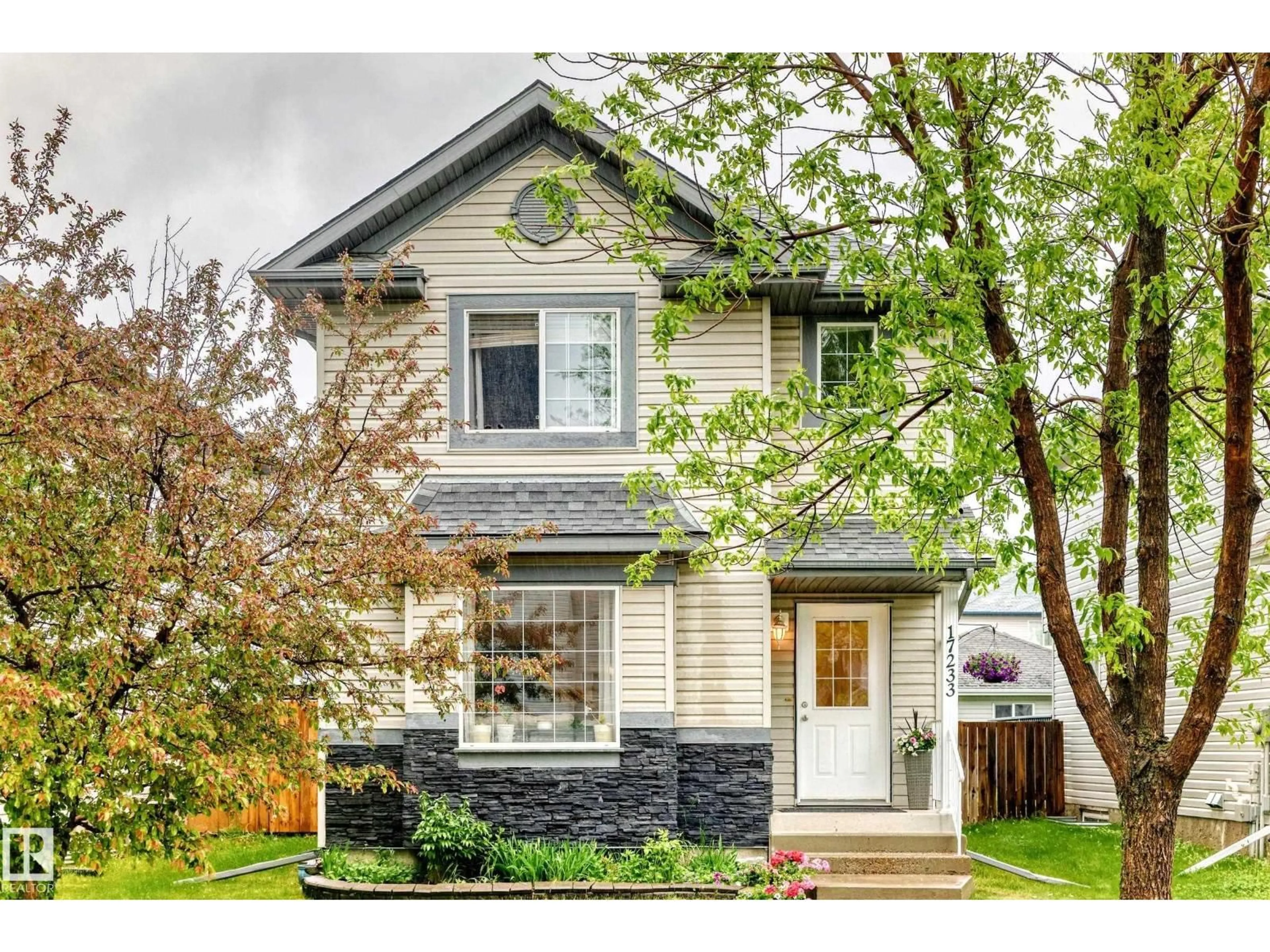 Home with vinyl exterior material, street for 17233 88 ST, Edmonton Alberta T5Z3R4