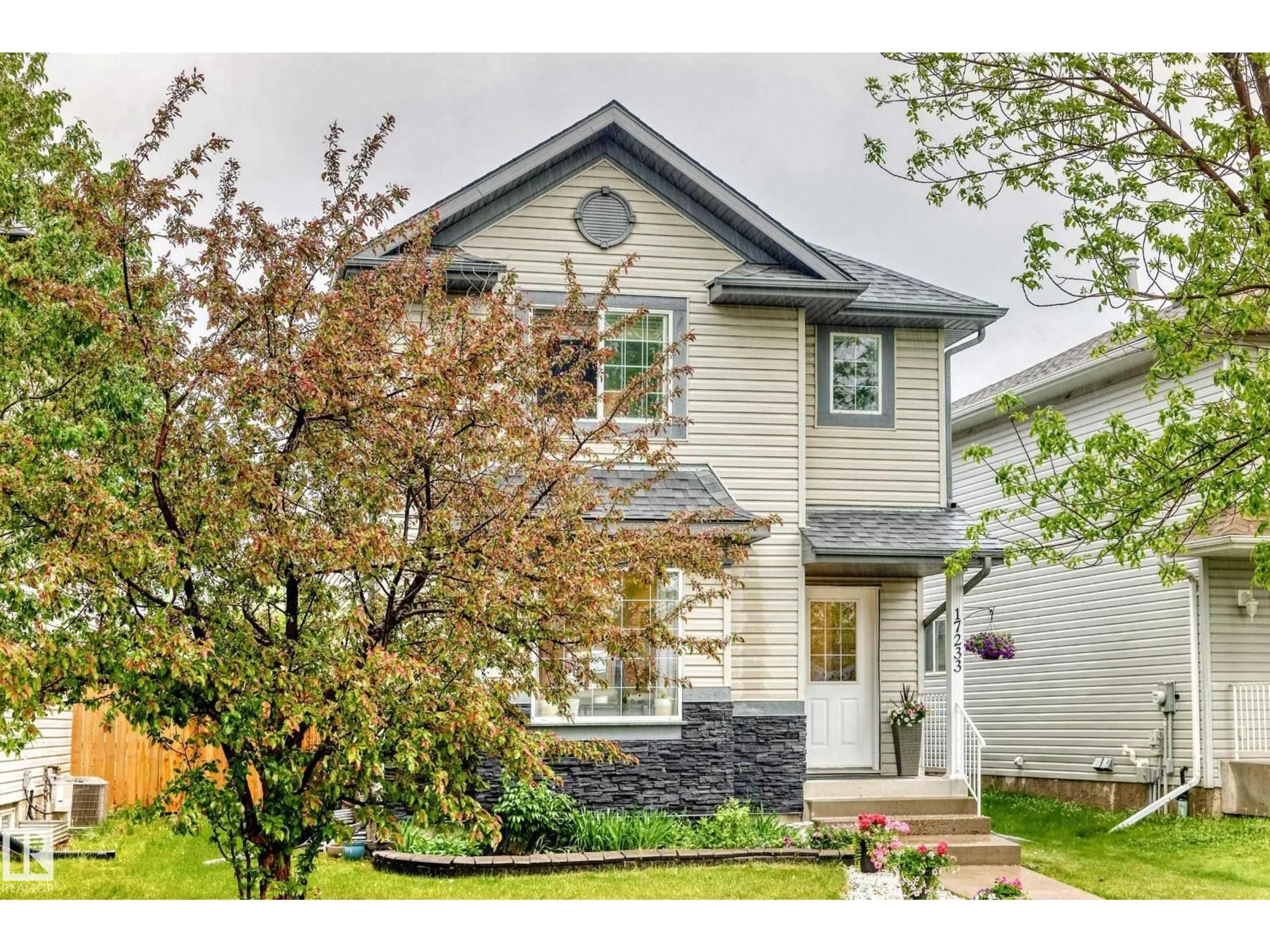 Home with vinyl exterior material, street for 17233 88 ST, Edmonton Alberta T5Z3R4