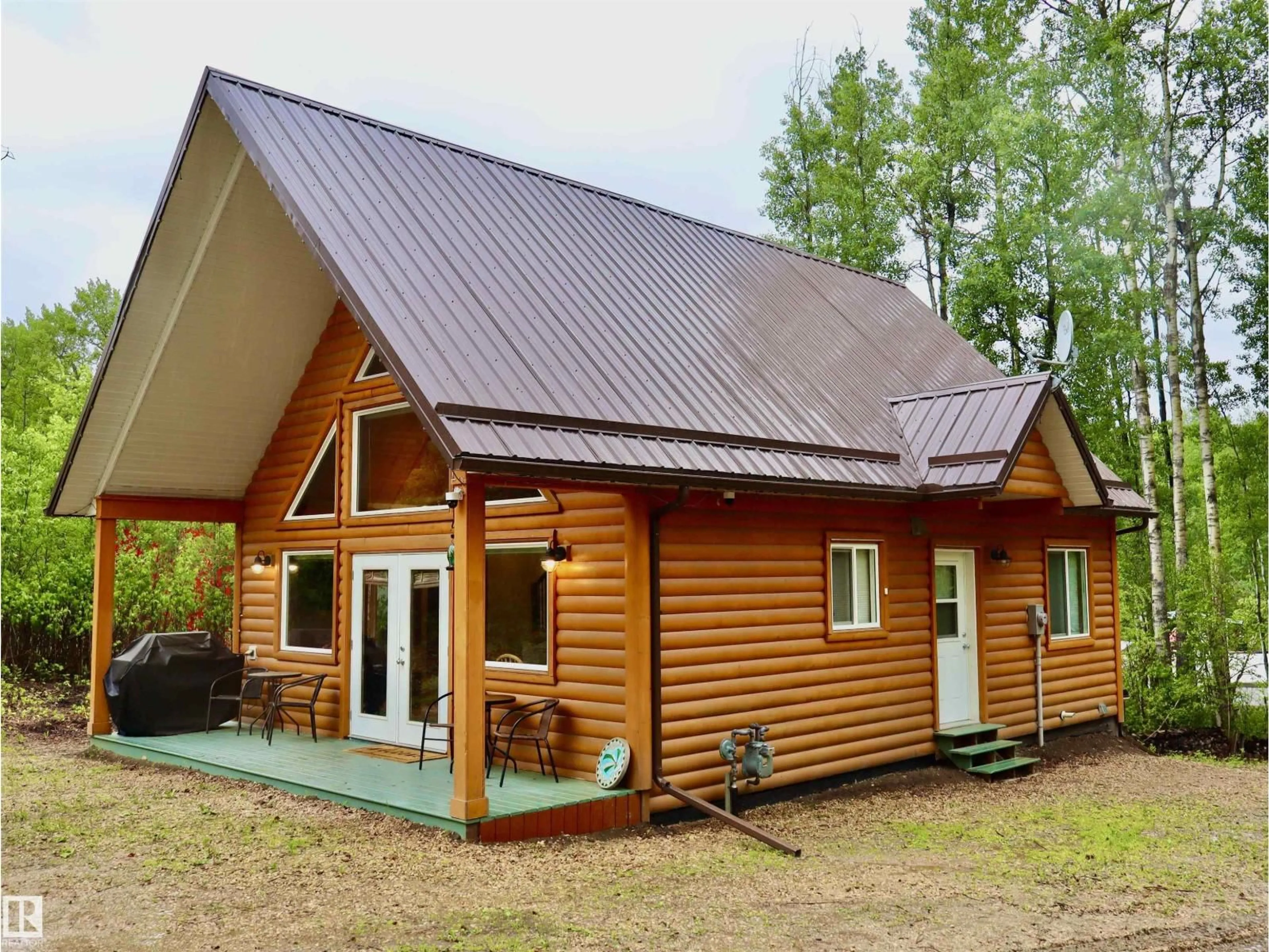 Home with vinyl exterior material, building for 59316 - 20 RR 54, Rural Barrhead County Alberta T7N1N3