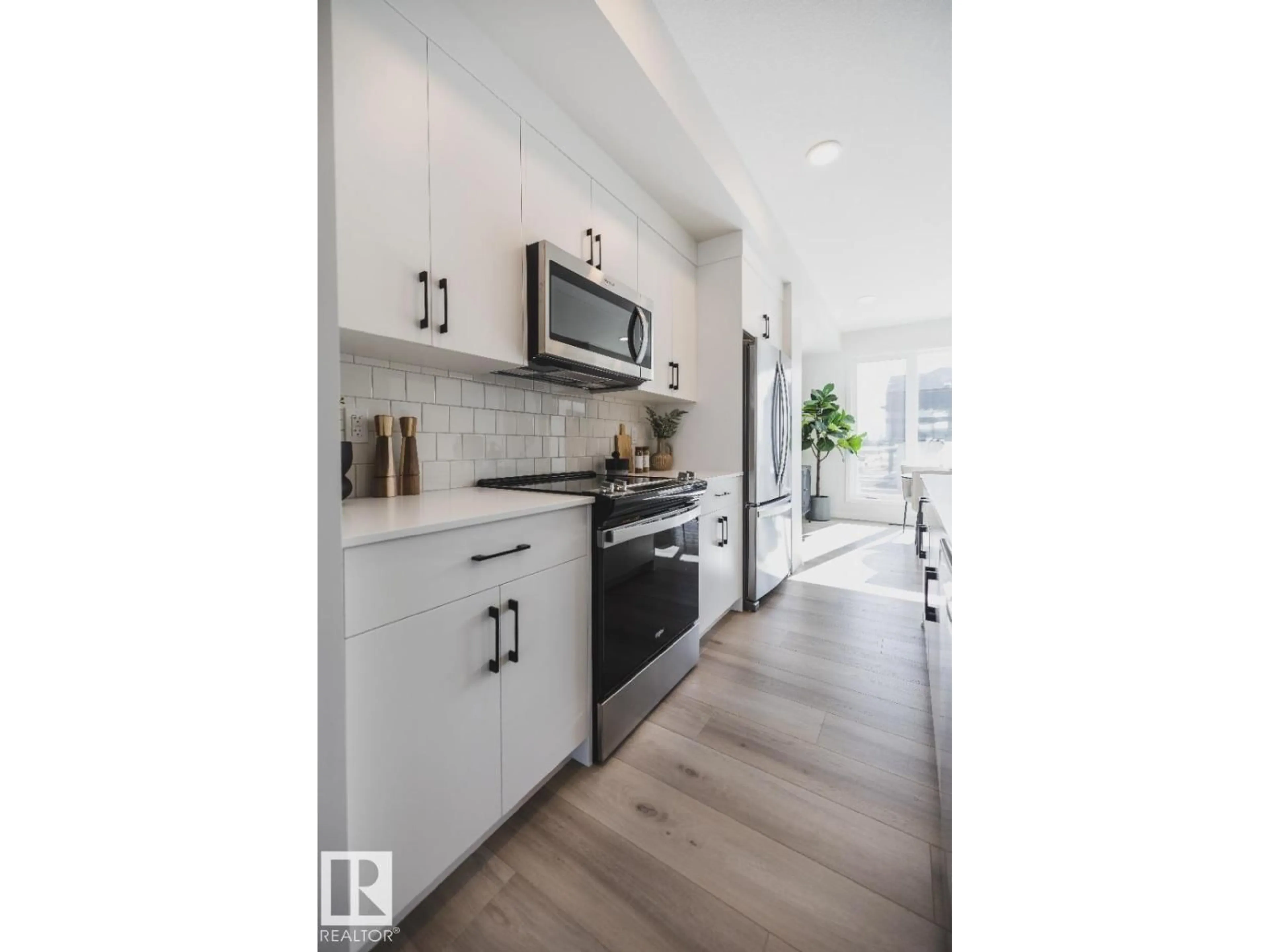 Open concept kitchen, unknown for 2626 ALCES WY, Edmonton Alberta T6X1A5