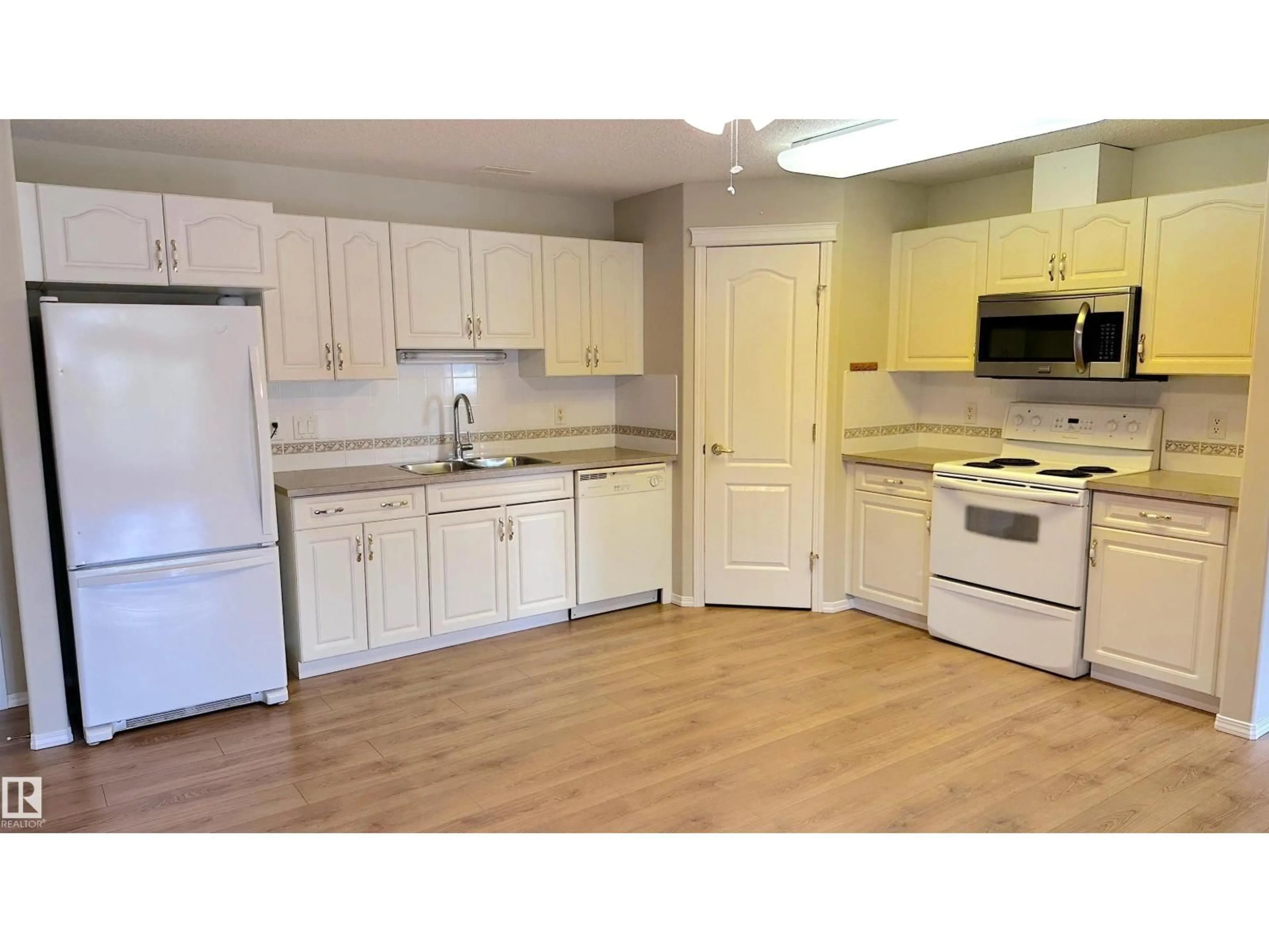 Standard kitchen, wood/laminate floor for 237 - 218 YOUVILLE DR, Edmonton Alberta T6L7G2