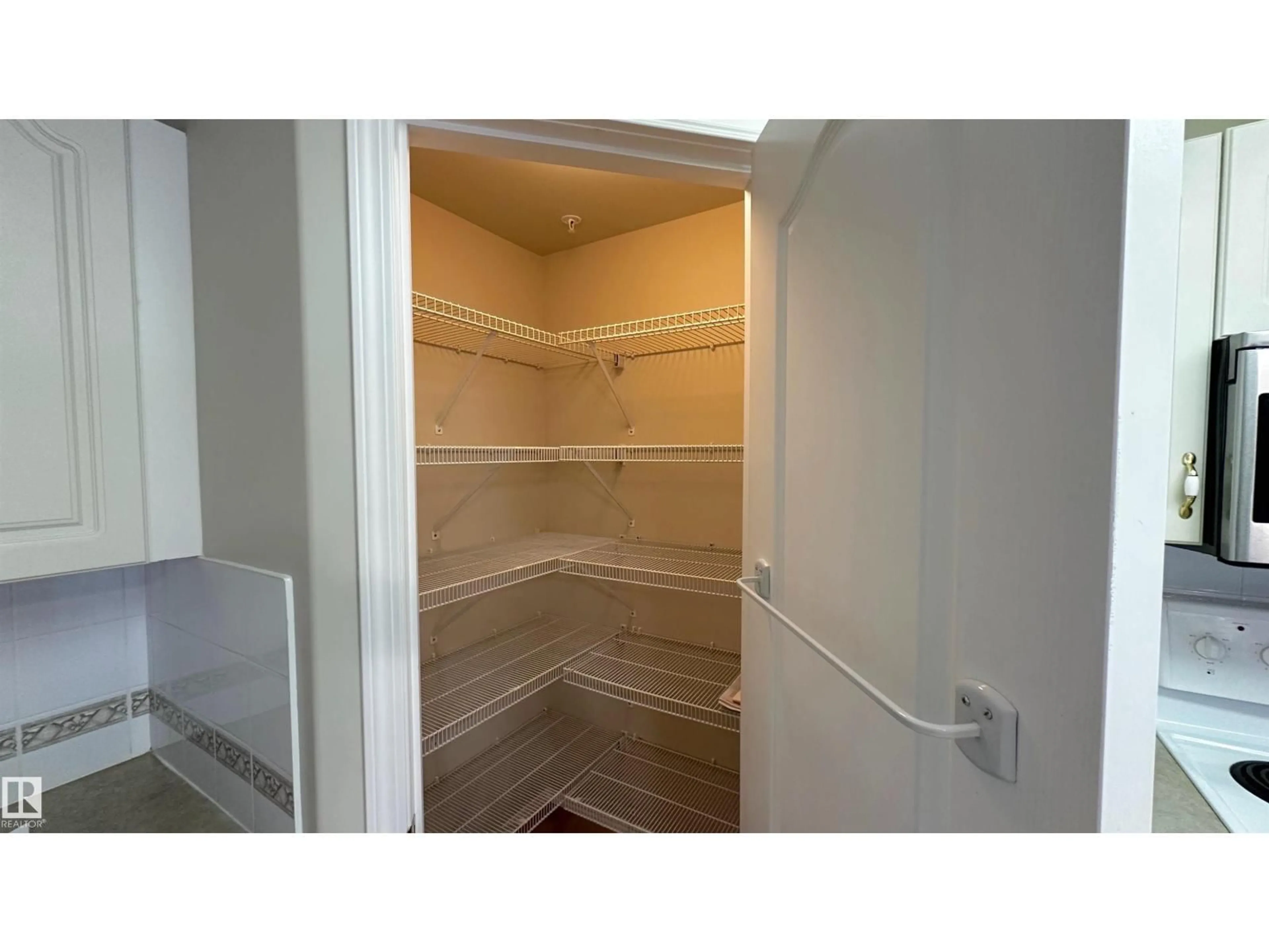 Storage room or clothes room or walk-in closet for 237 - 218 YOUVILLE DR, Edmonton Alberta T6L7G2